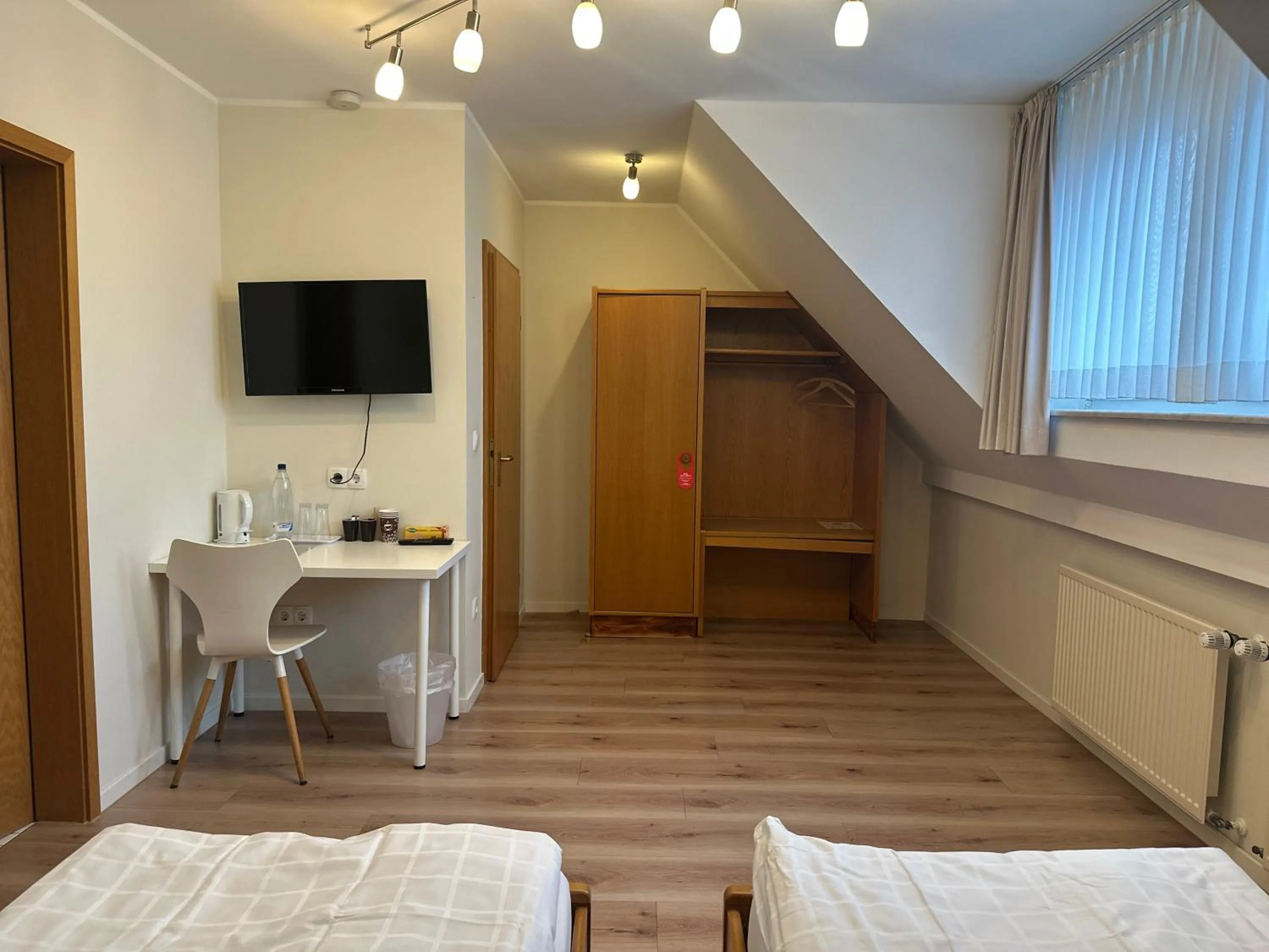 Photo of the whole room, Bed in Landgasthaus Hotel Wolters