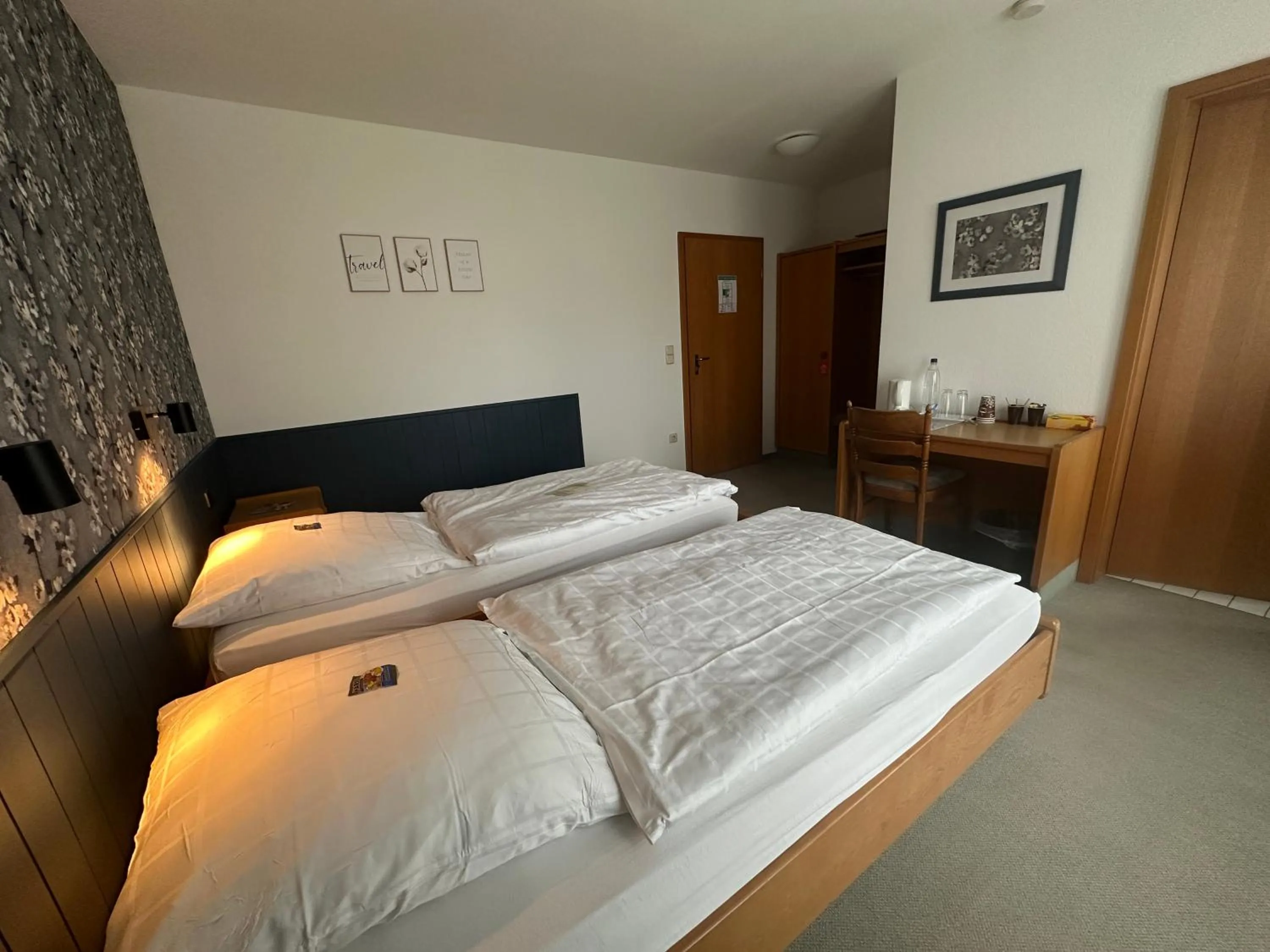 Photo of the whole room, Bed in Landgasthaus Hotel Wolters