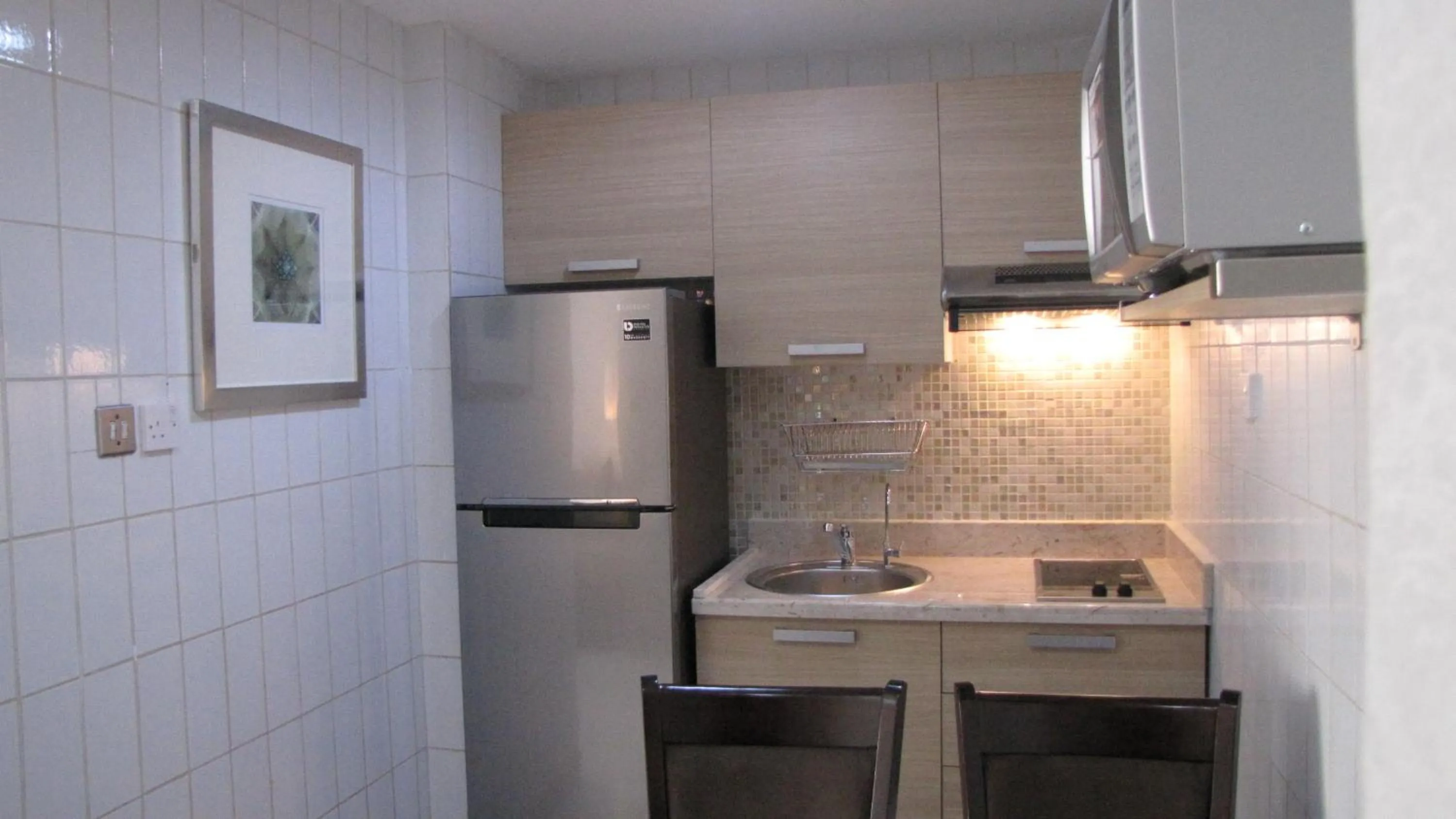 Kitchen or kitchenette in Kuwait Residence