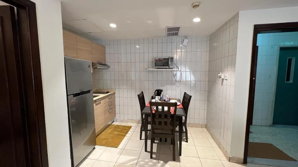 Kitchen or kitchenette in Kuwait Residence