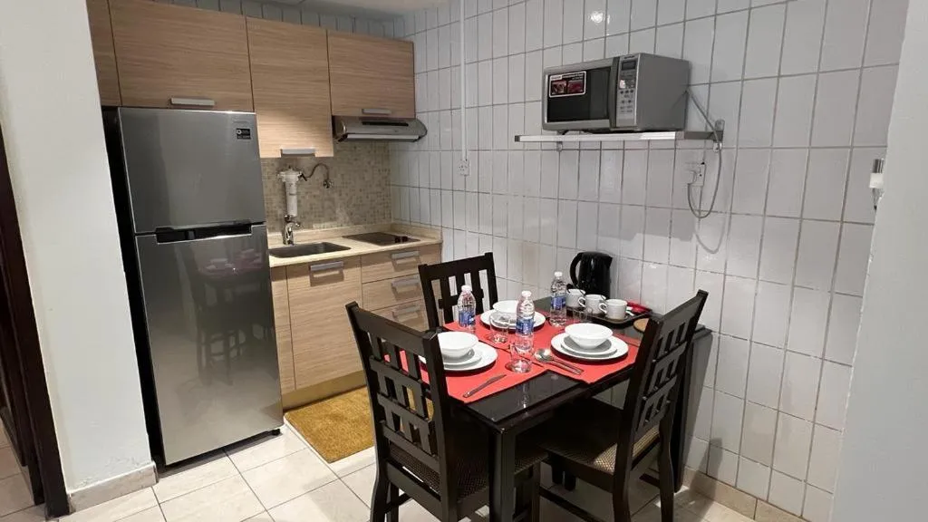 Kitchen or kitchenette in Kuwait Residence