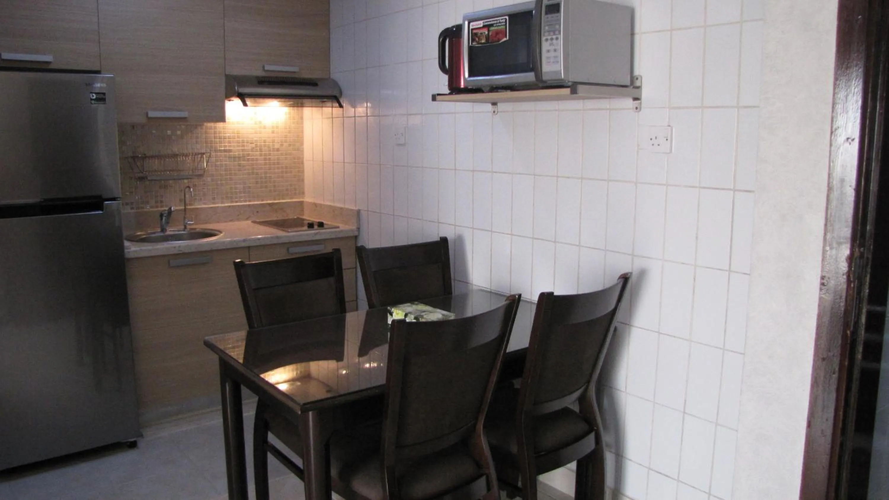 Kitchen or kitchenette in Kuwait Residence