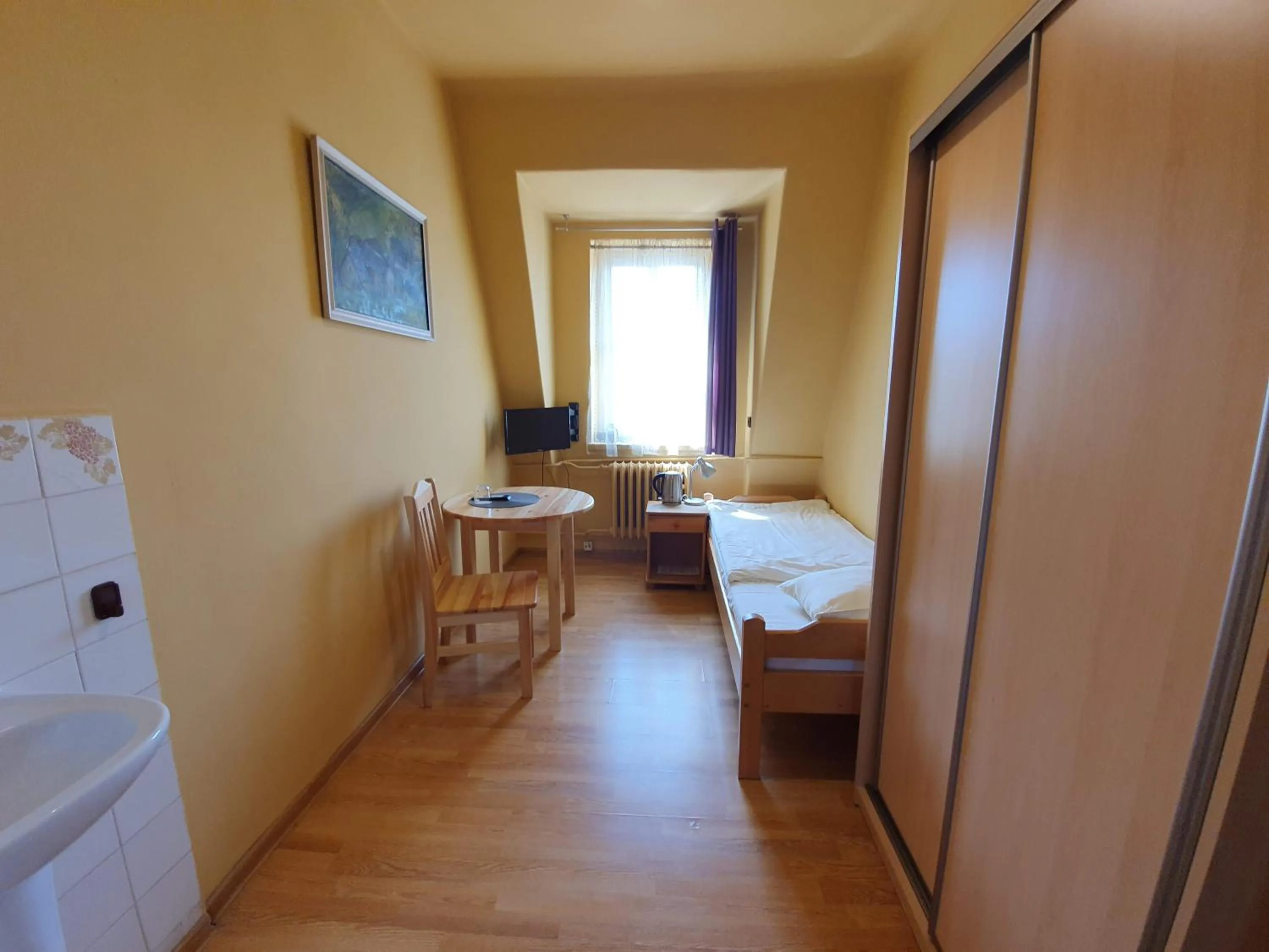 Seating area, Bed in Dom Turysty PTTK w Bielsku - Białej