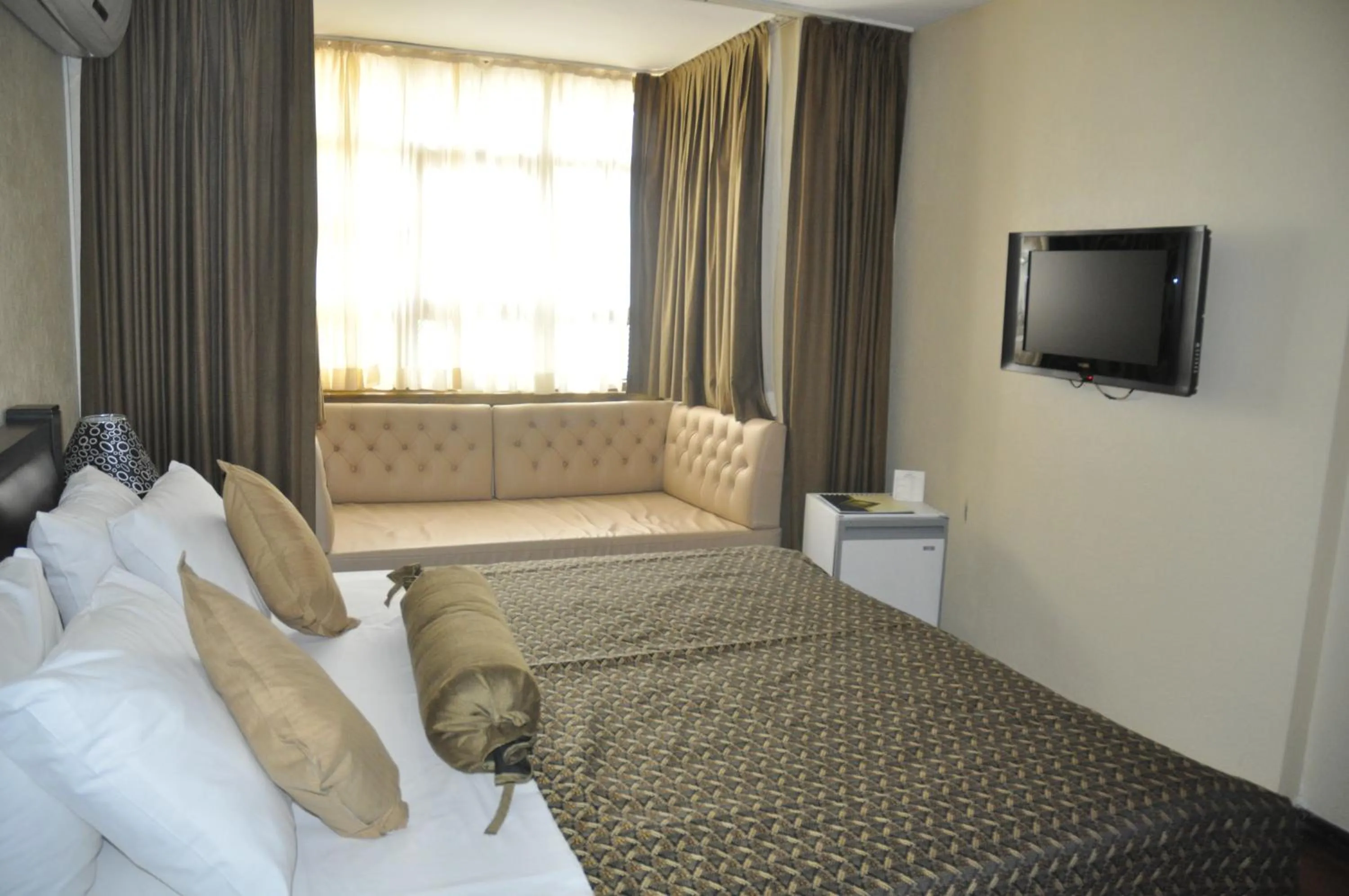 Bed in Ulasan Hotel Caravan Camping