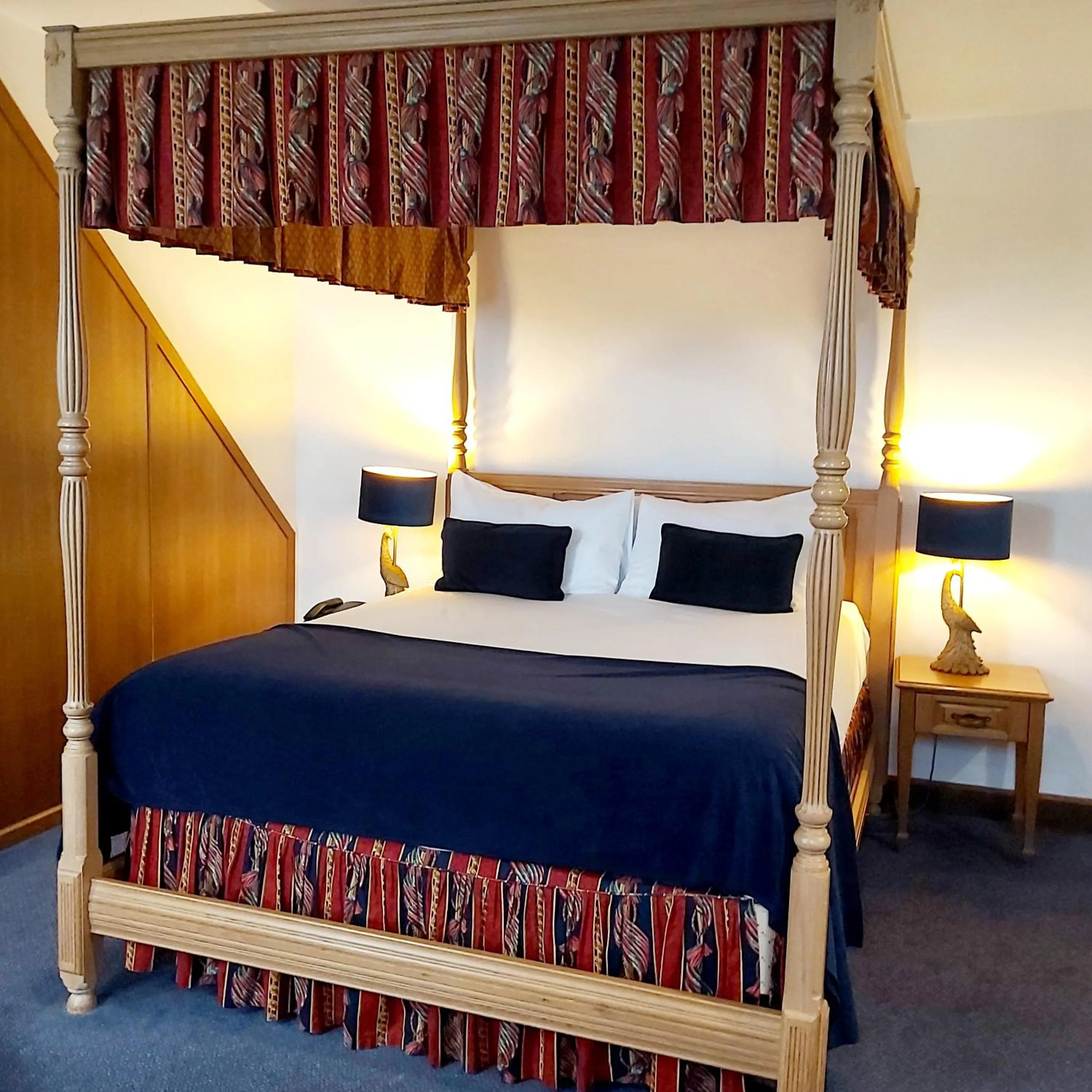 Bed in The Old Ram Coaching Inn