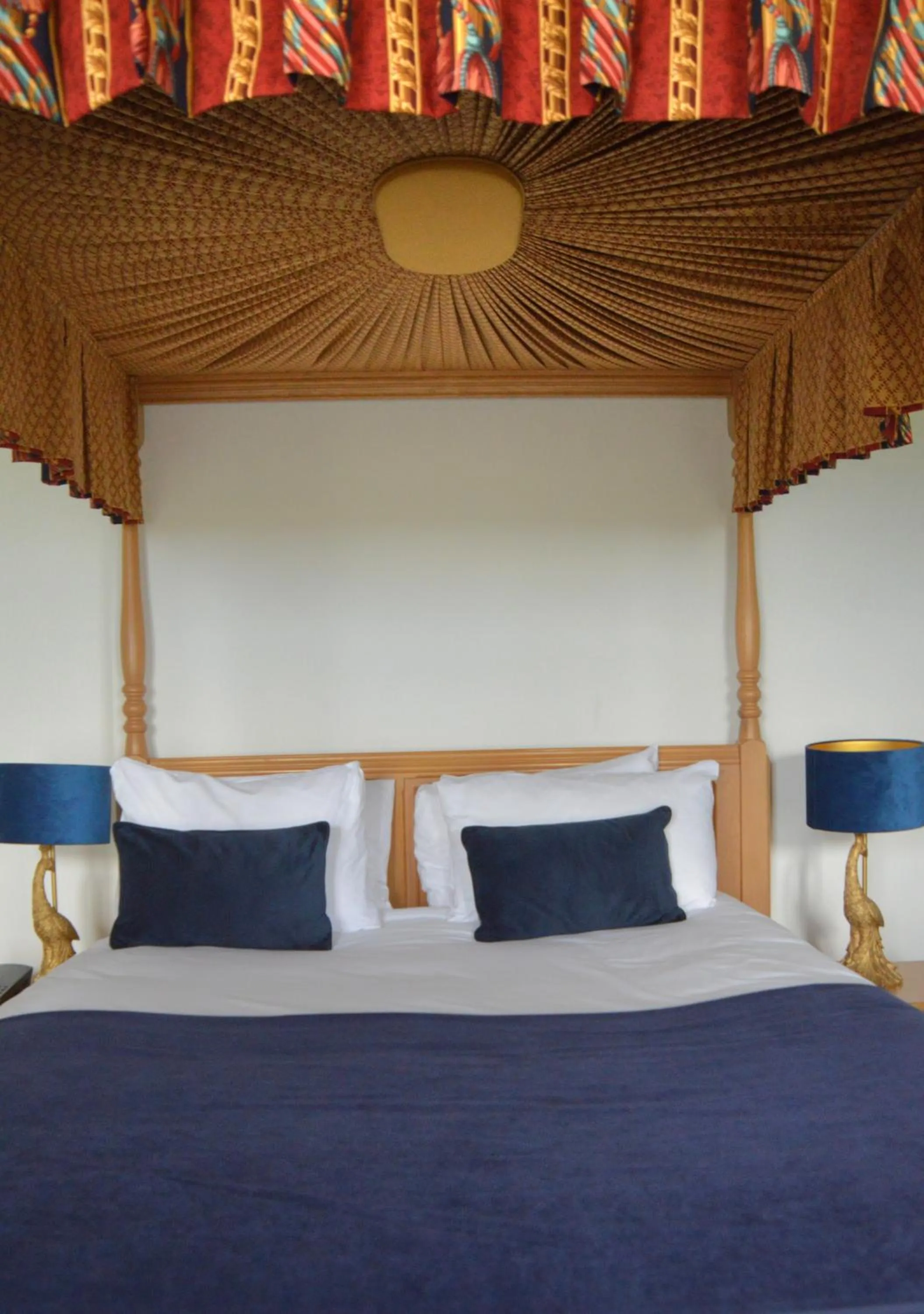 Bed in The Old Ram Coaching Inn