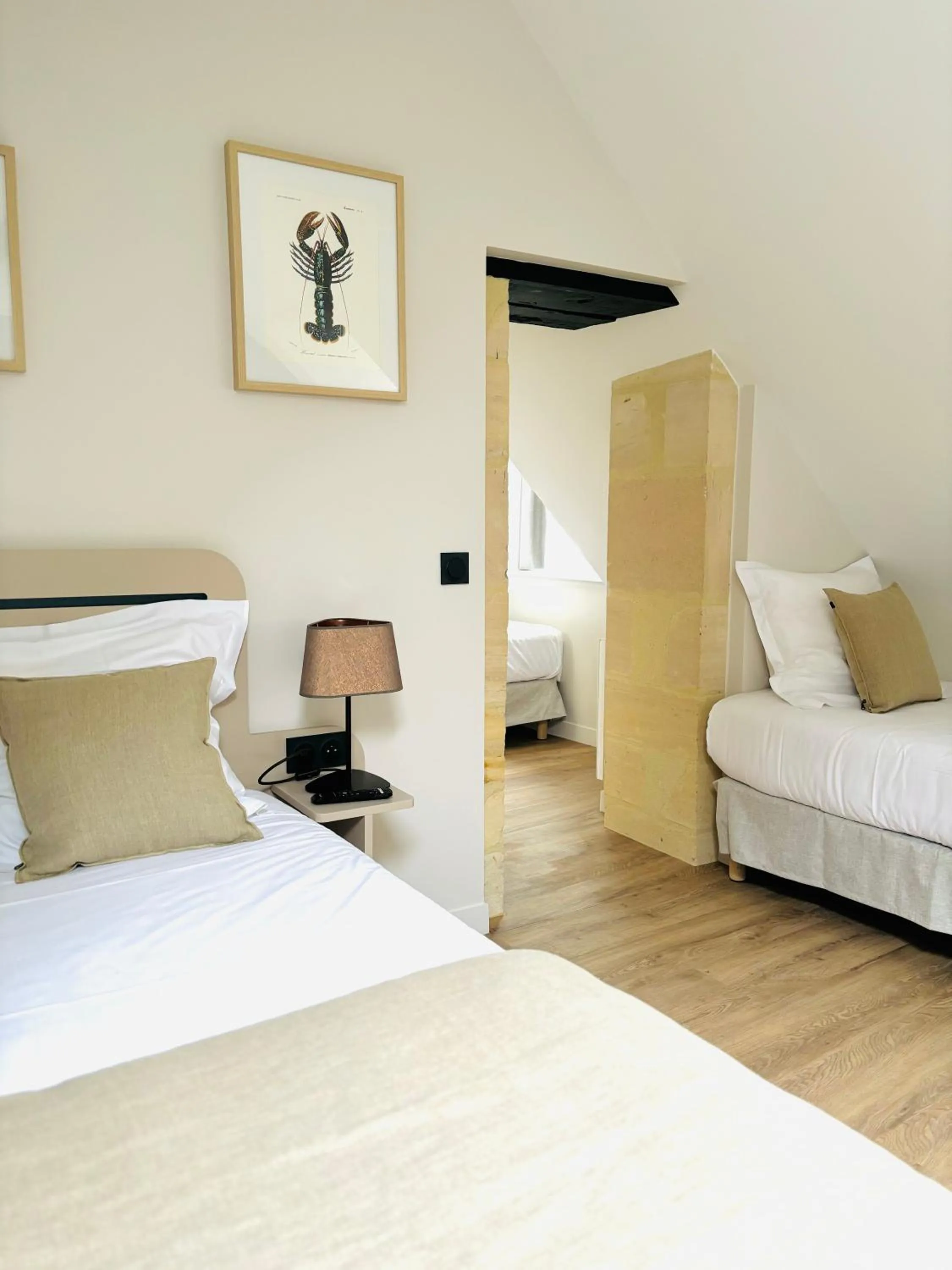 Bed in Hôtel De La Marine