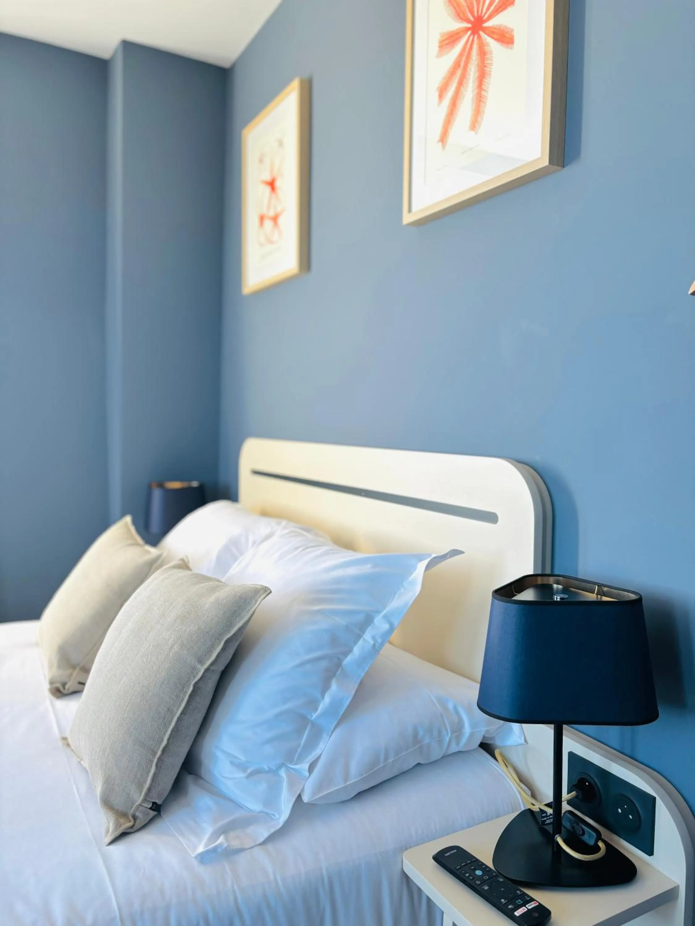 Bed in Hôtel De La Marine