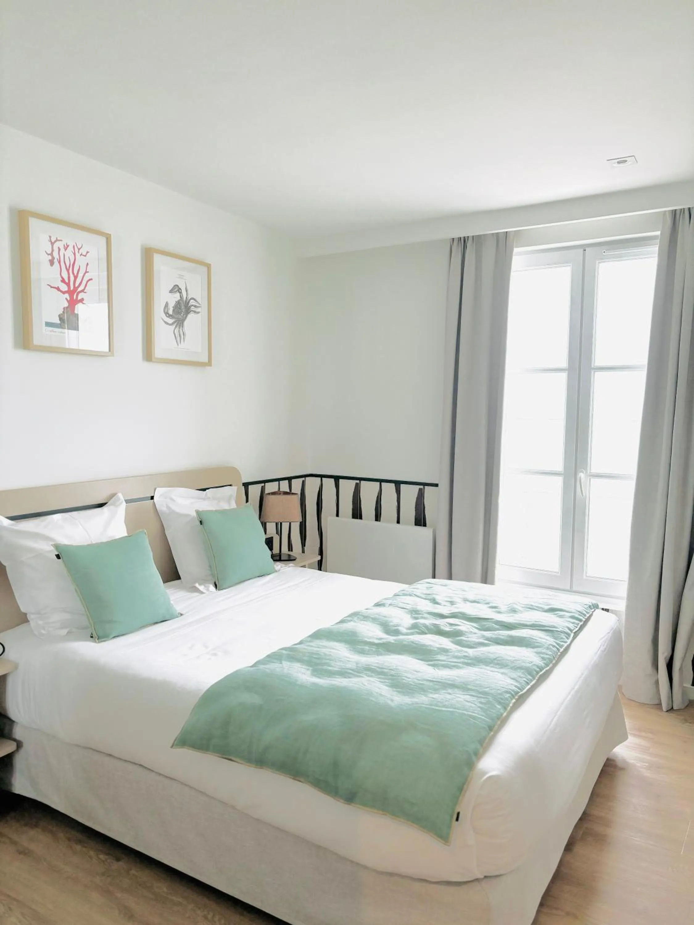 Bed in Hôtel De La Marine