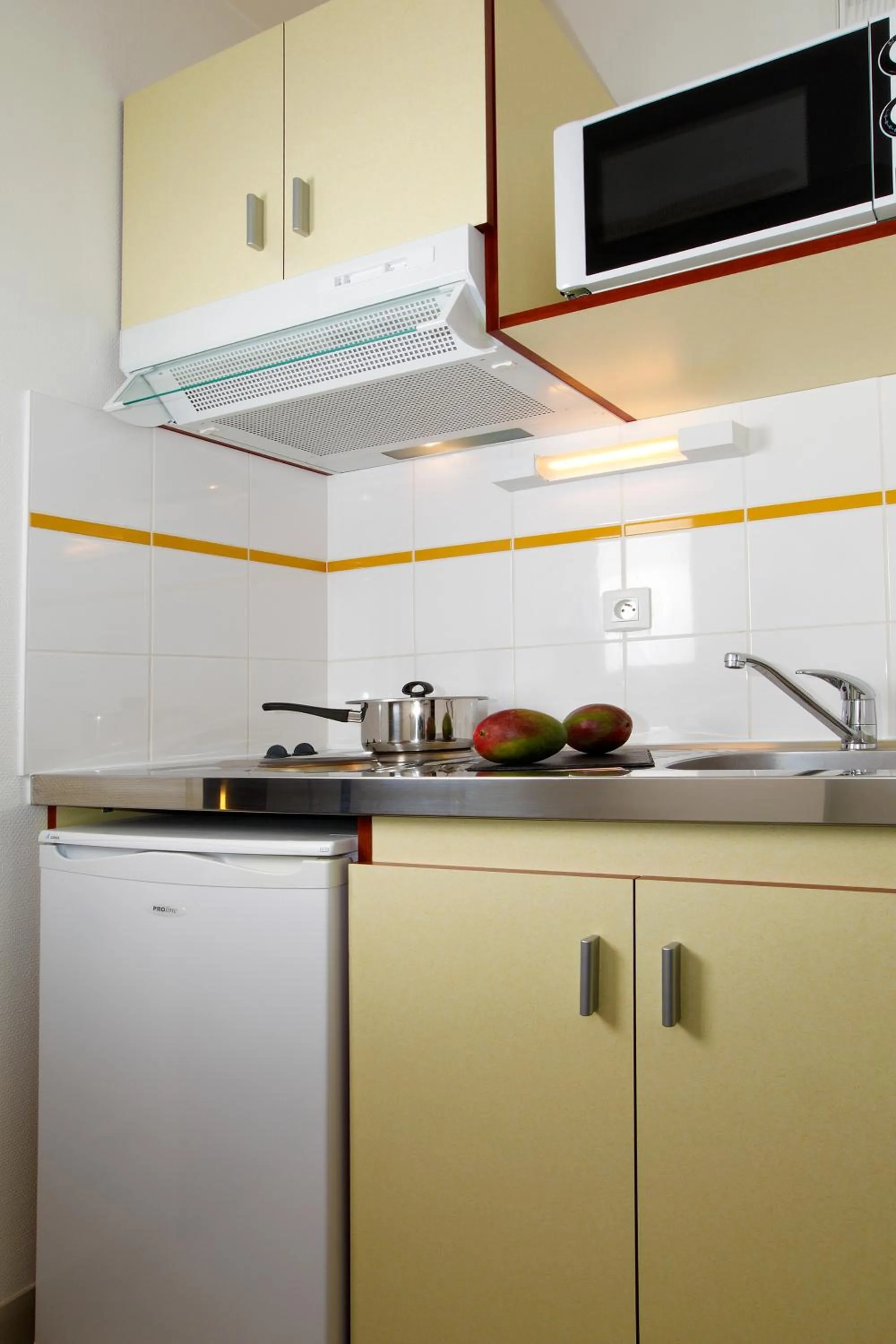 Kitchen or kitchenette in Appart'City Classic Rennes Beauregard
