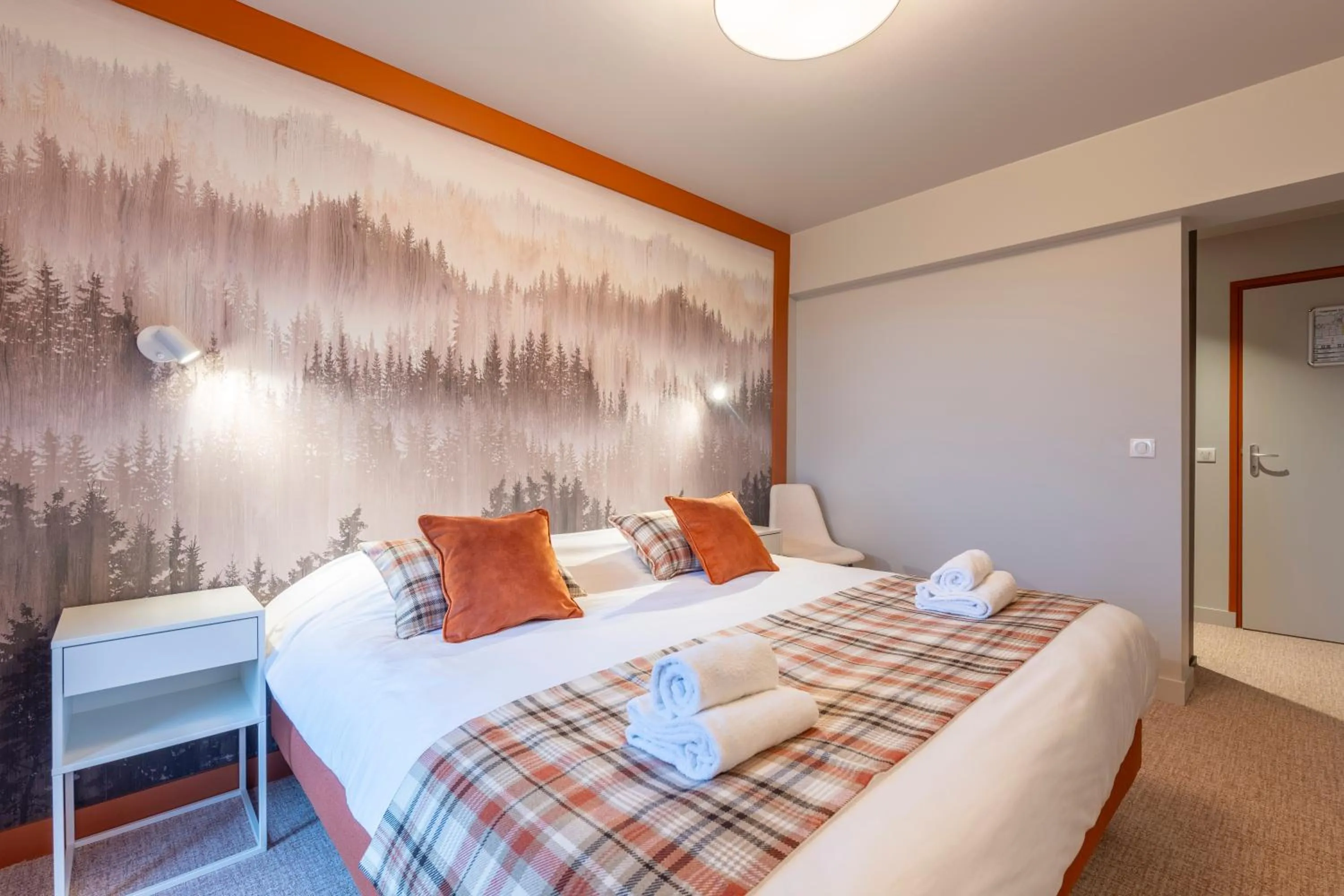 Bed in Hotel Le Bois Joli