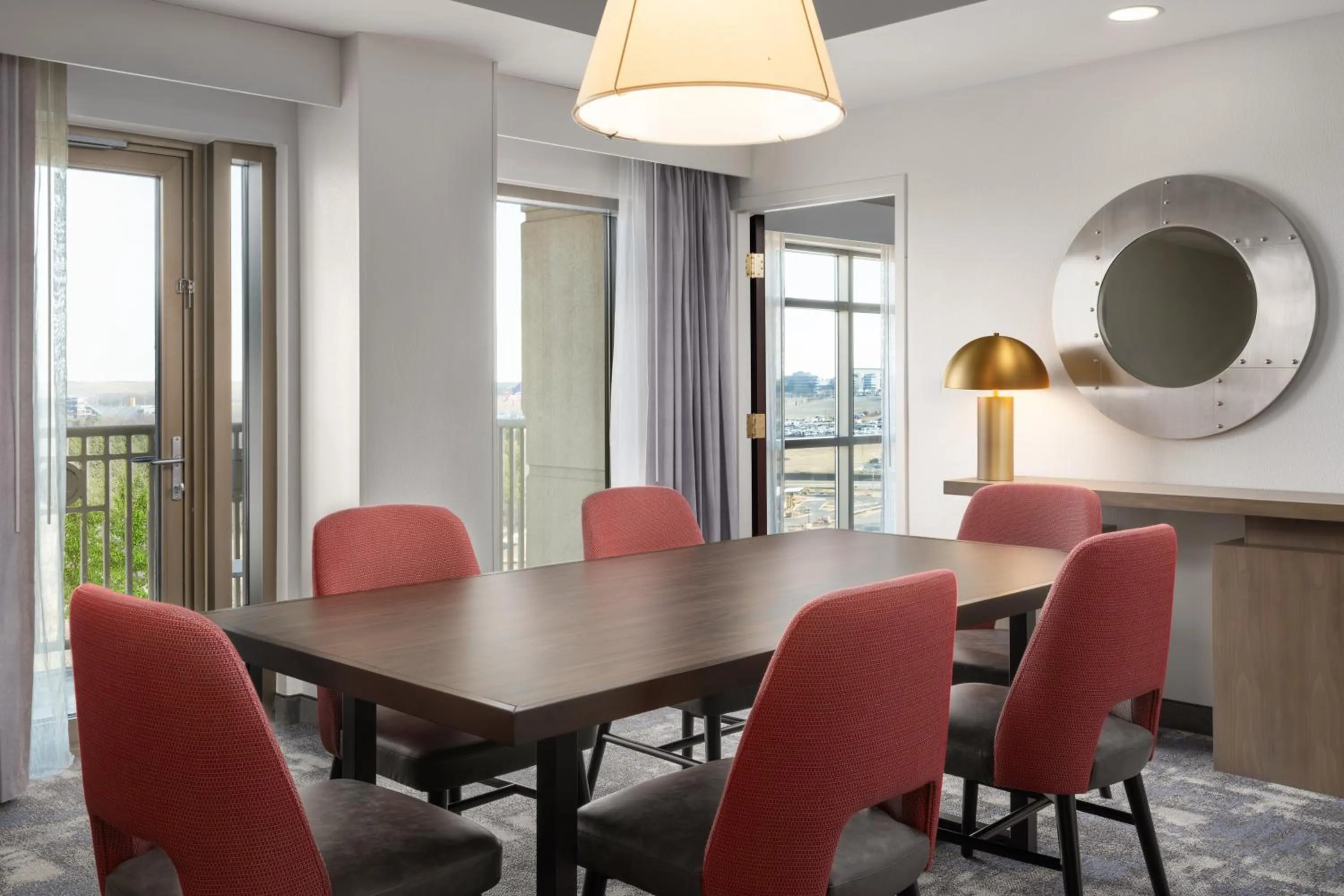 Living room in Embassy Suites by Hilton Charlotte Concord Golf Resort & Spa