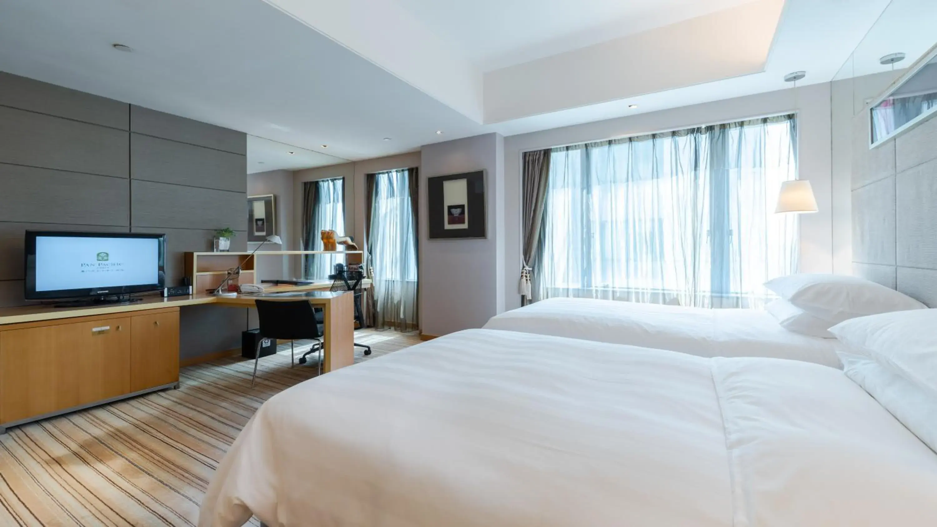 Photo of the whole room, Bed in Pan Pacific Xiamen(Near the Ferry to Gulang Island and Metro Station) Photo of the whole room, Bed in Pan Pacific Xiamen(Near the Ferry to Gulang Island and Metro Station)