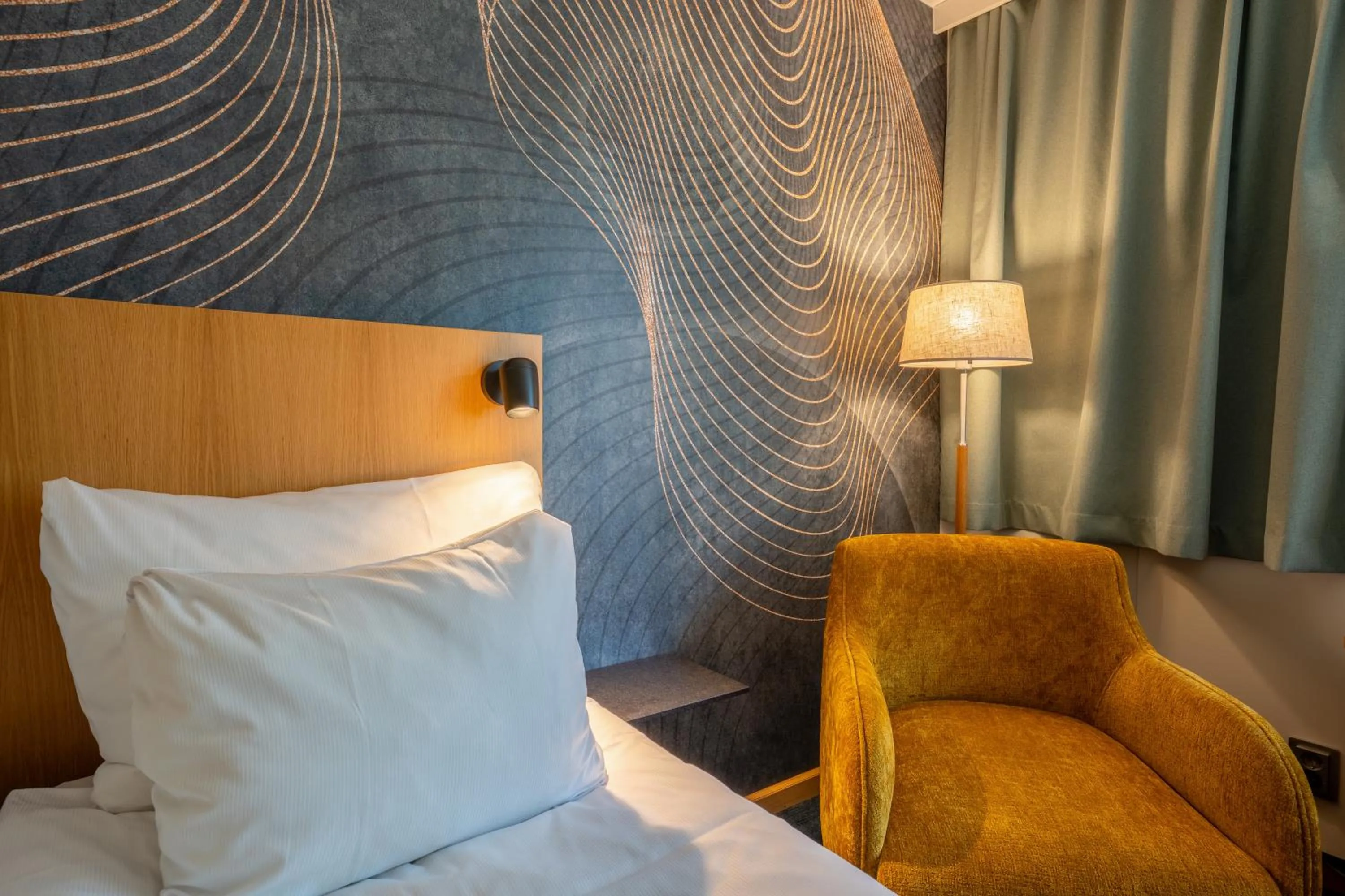 Bed in ProfilHotels Aveny