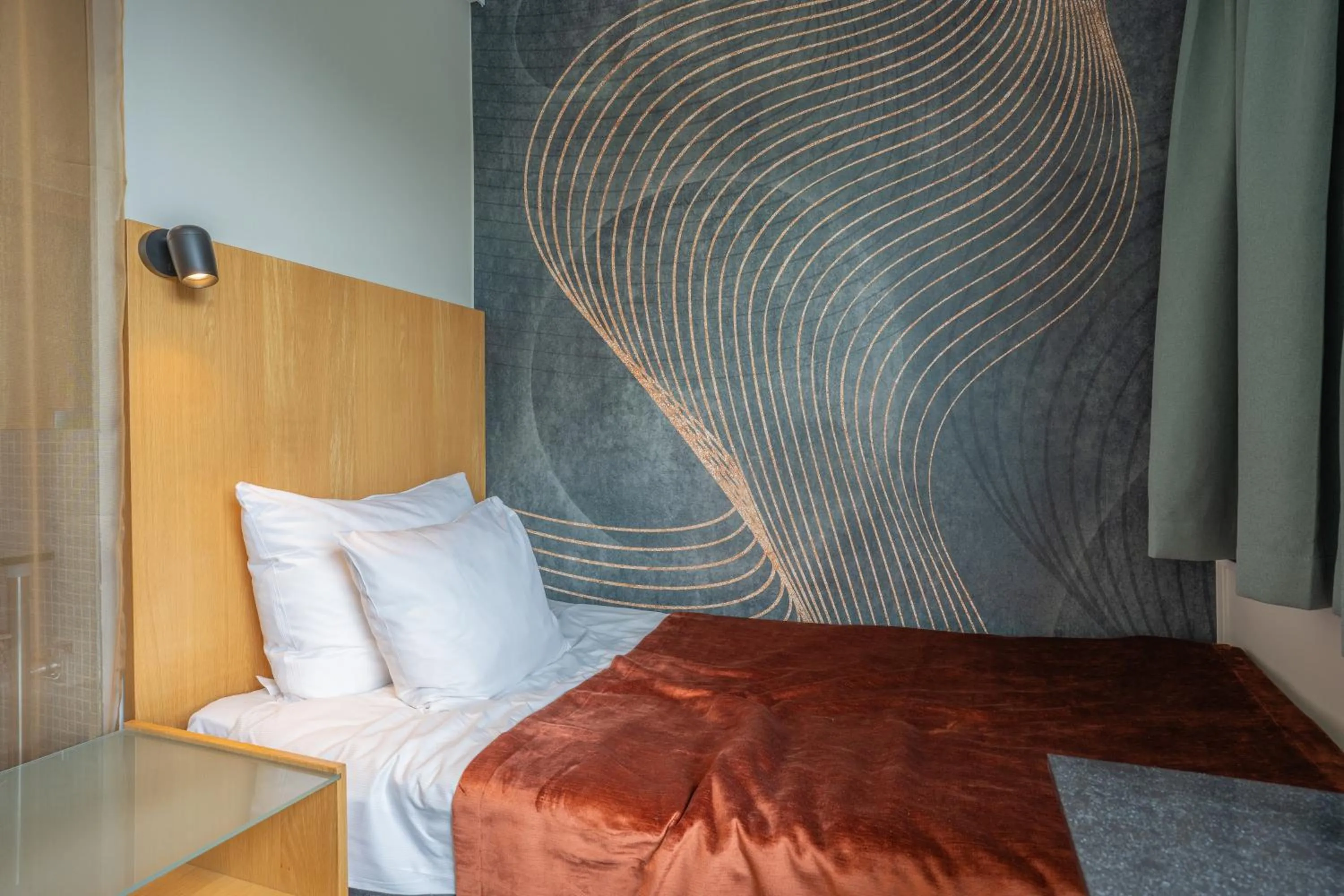 Bed in ProfilHotels Aveny