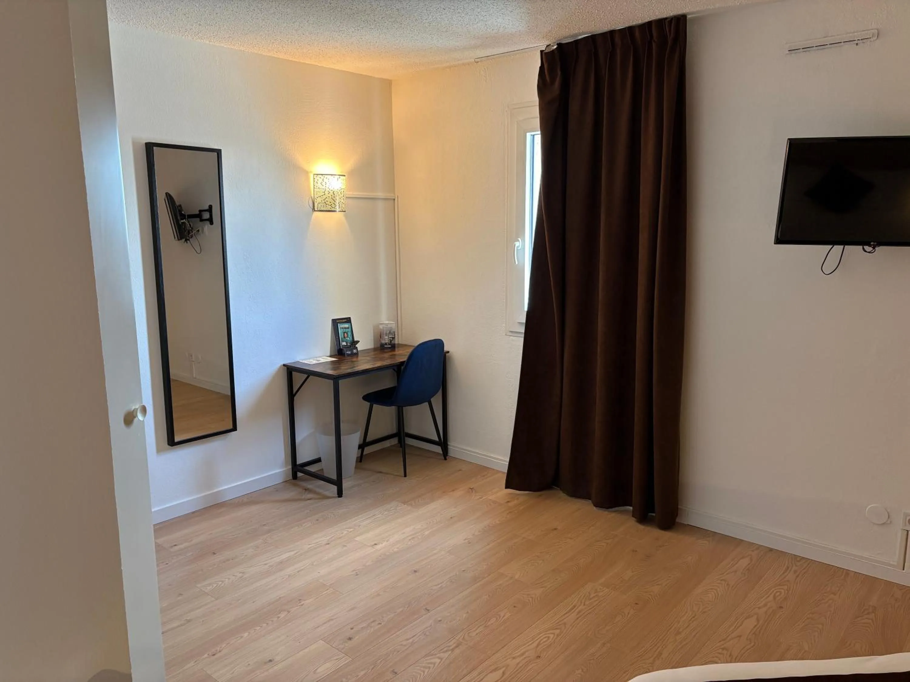 Seating area in Contact Hôtel des États-Unis