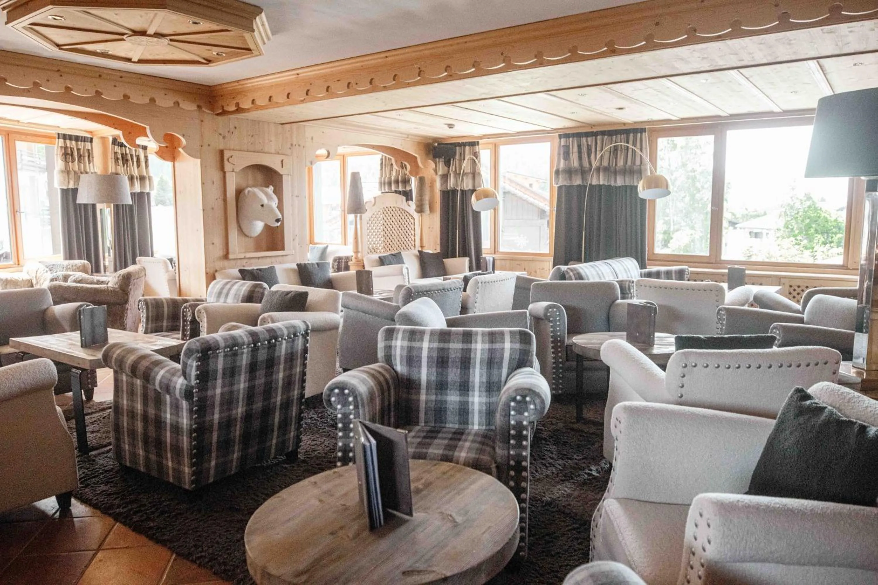 Living room in Hôtel Alpina & SPA - Restaurant Oxalis