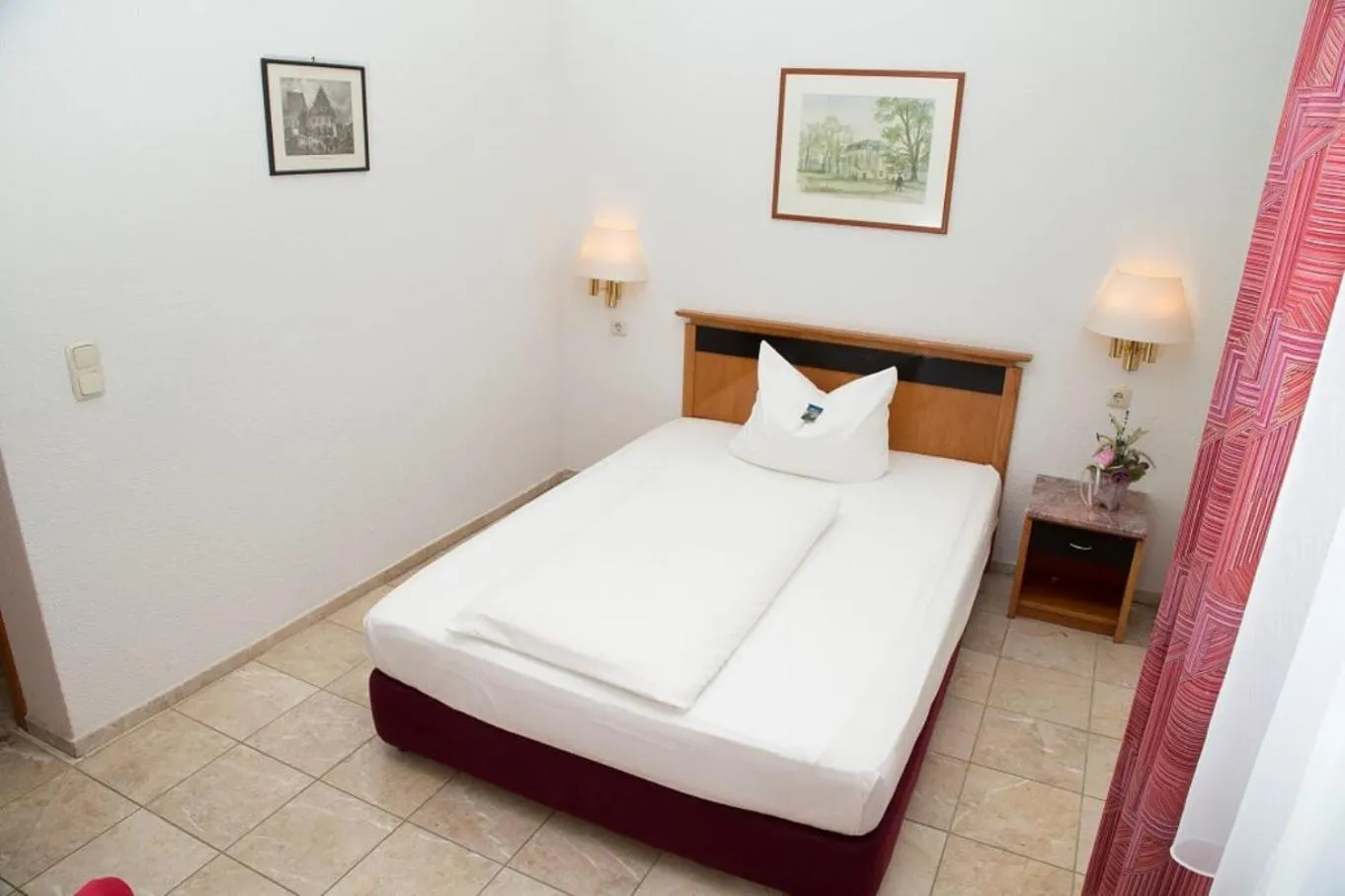 Bed in Parkhotel Altenburg