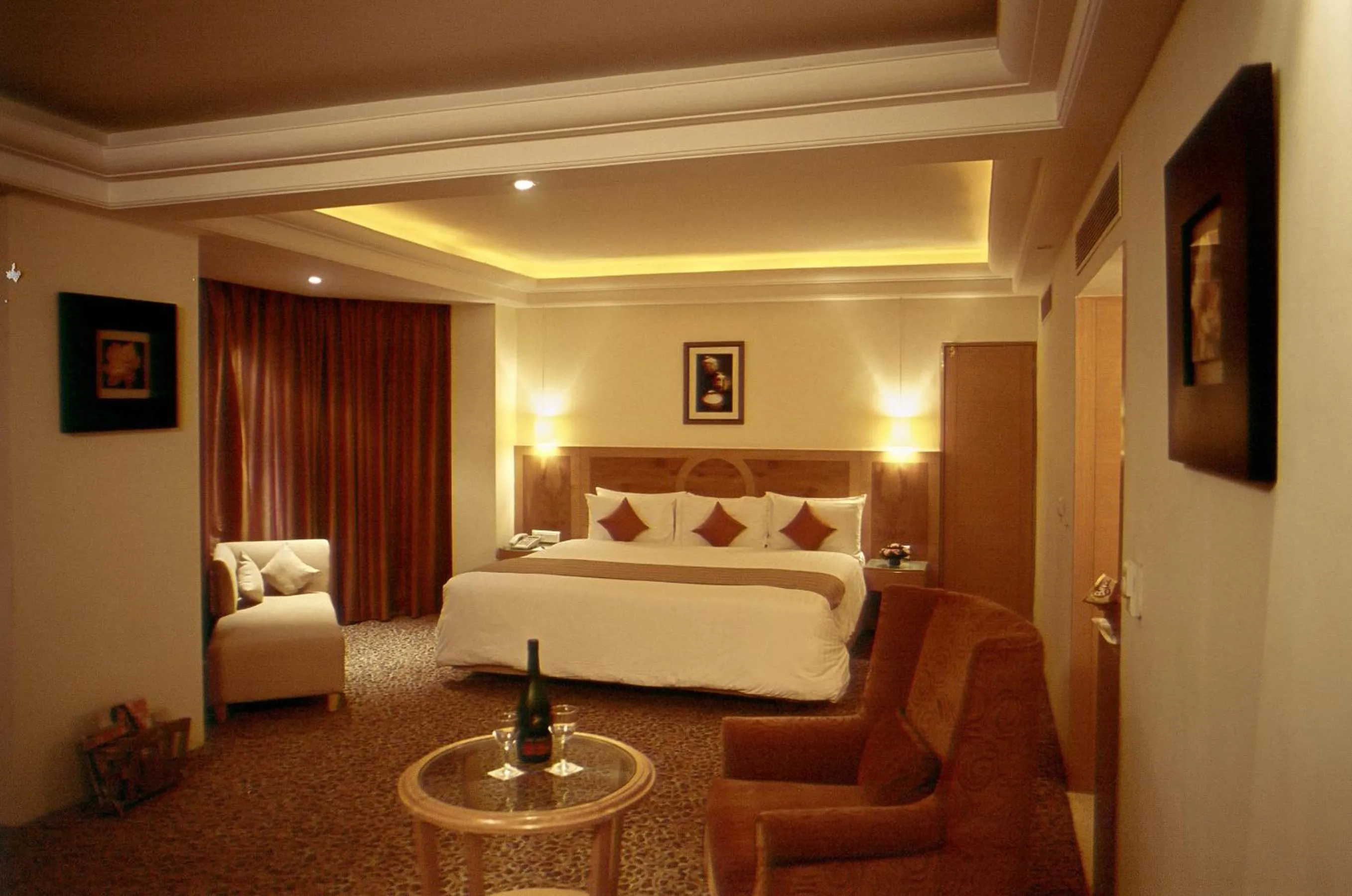 Bed in Katriya Hotel and Tower