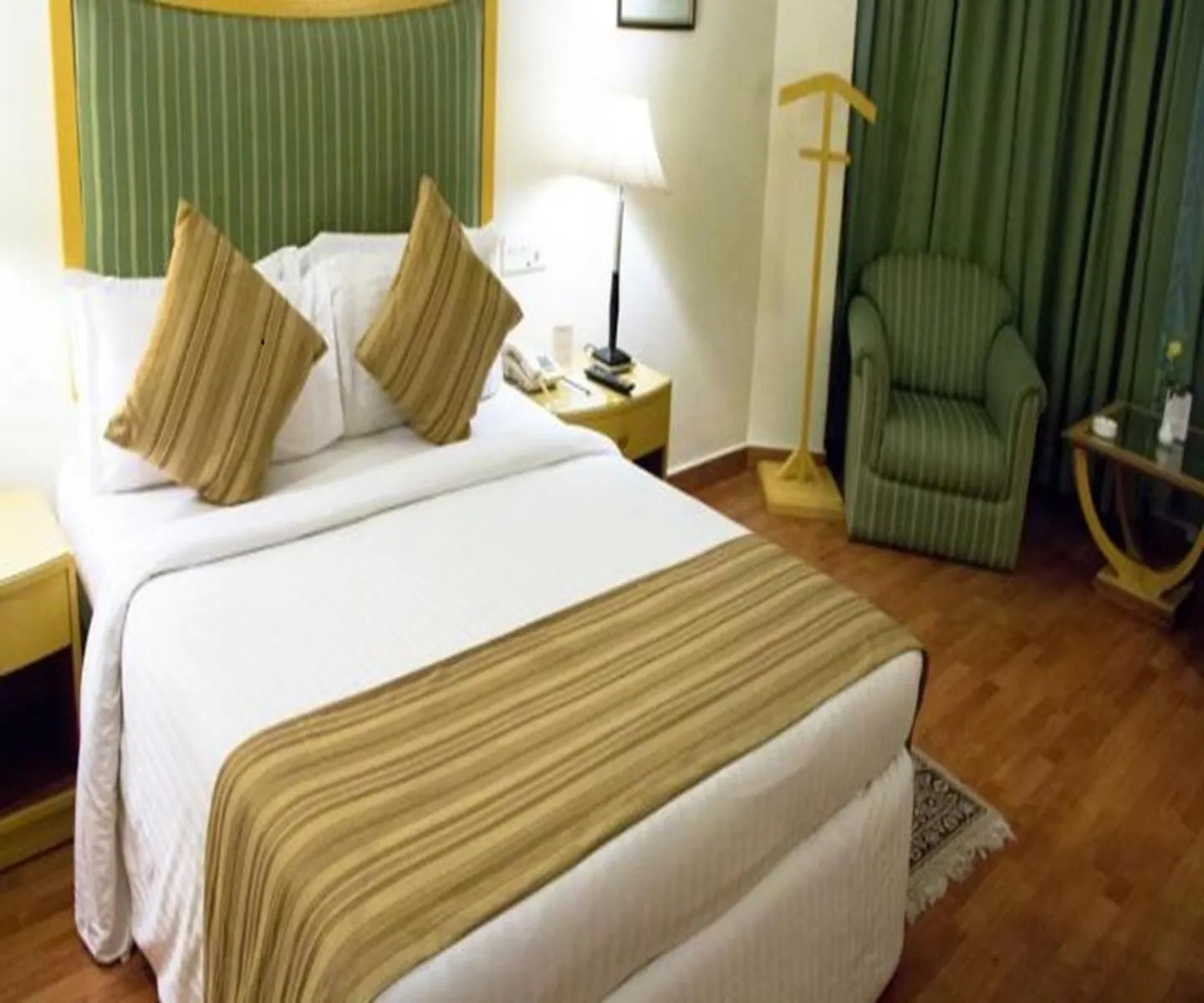 Bed in Katriya Hotel and Tower