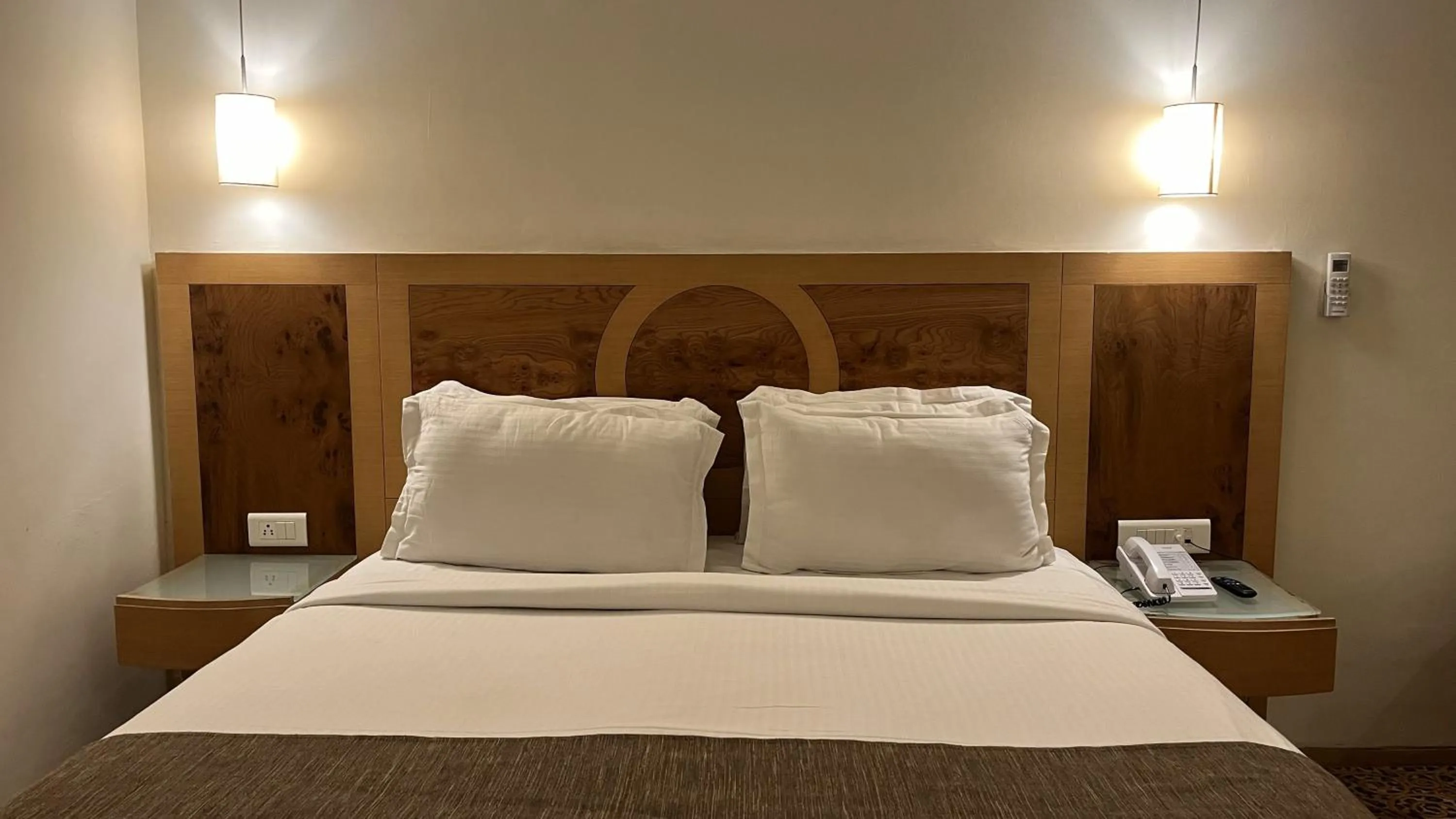 Bed in Katriya Hotel and Tower