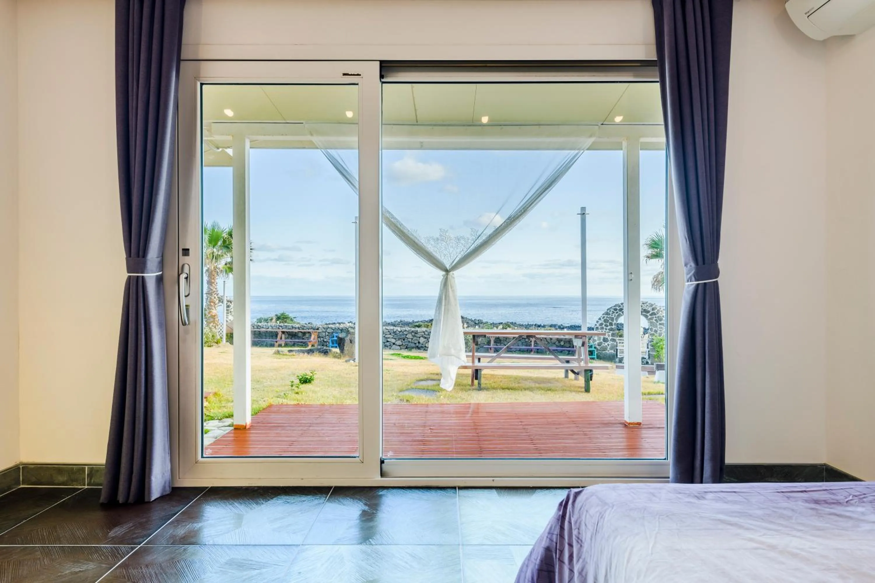 Bed in Jeju Turning point Pension