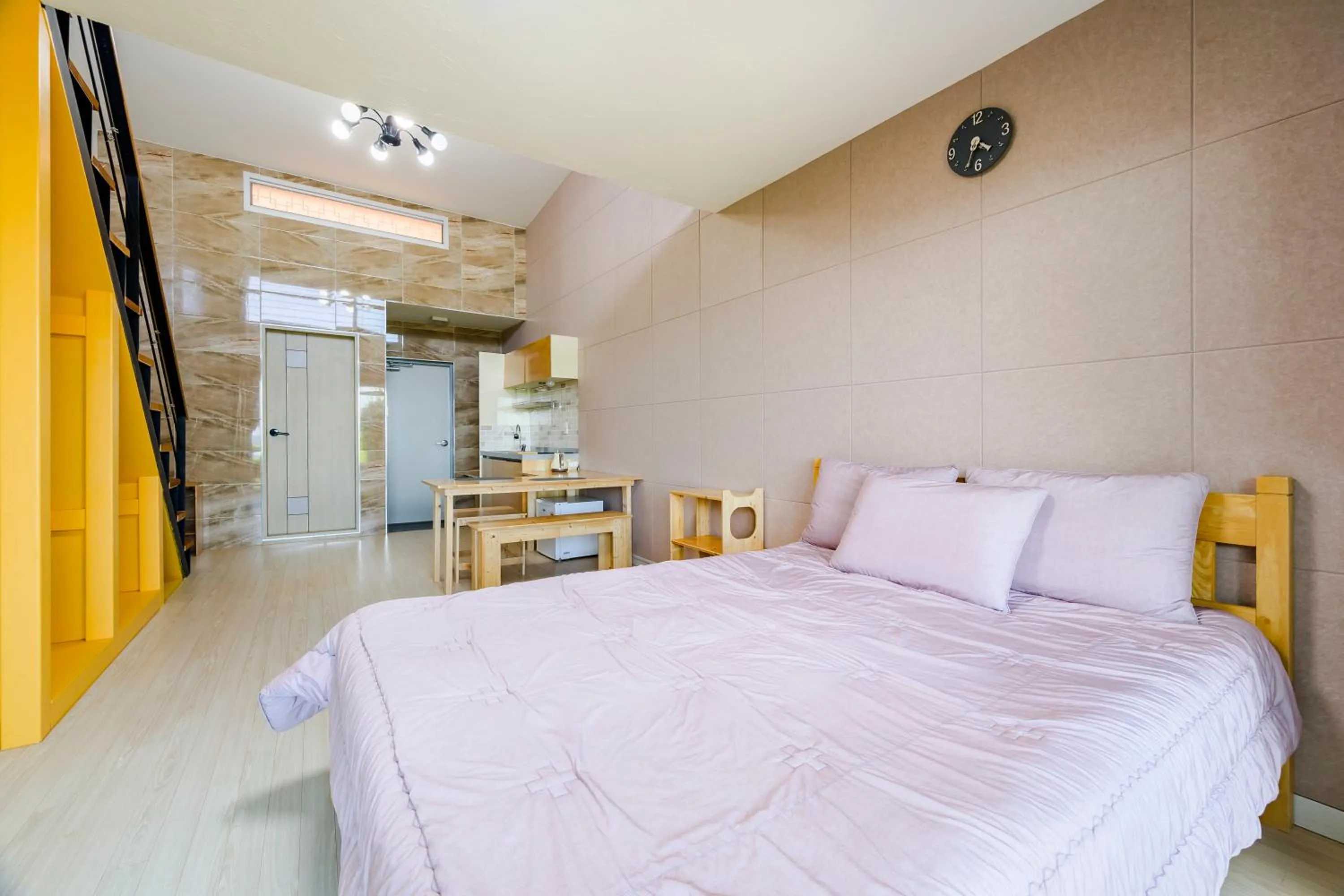 Bed in Jeju Turning point Pension