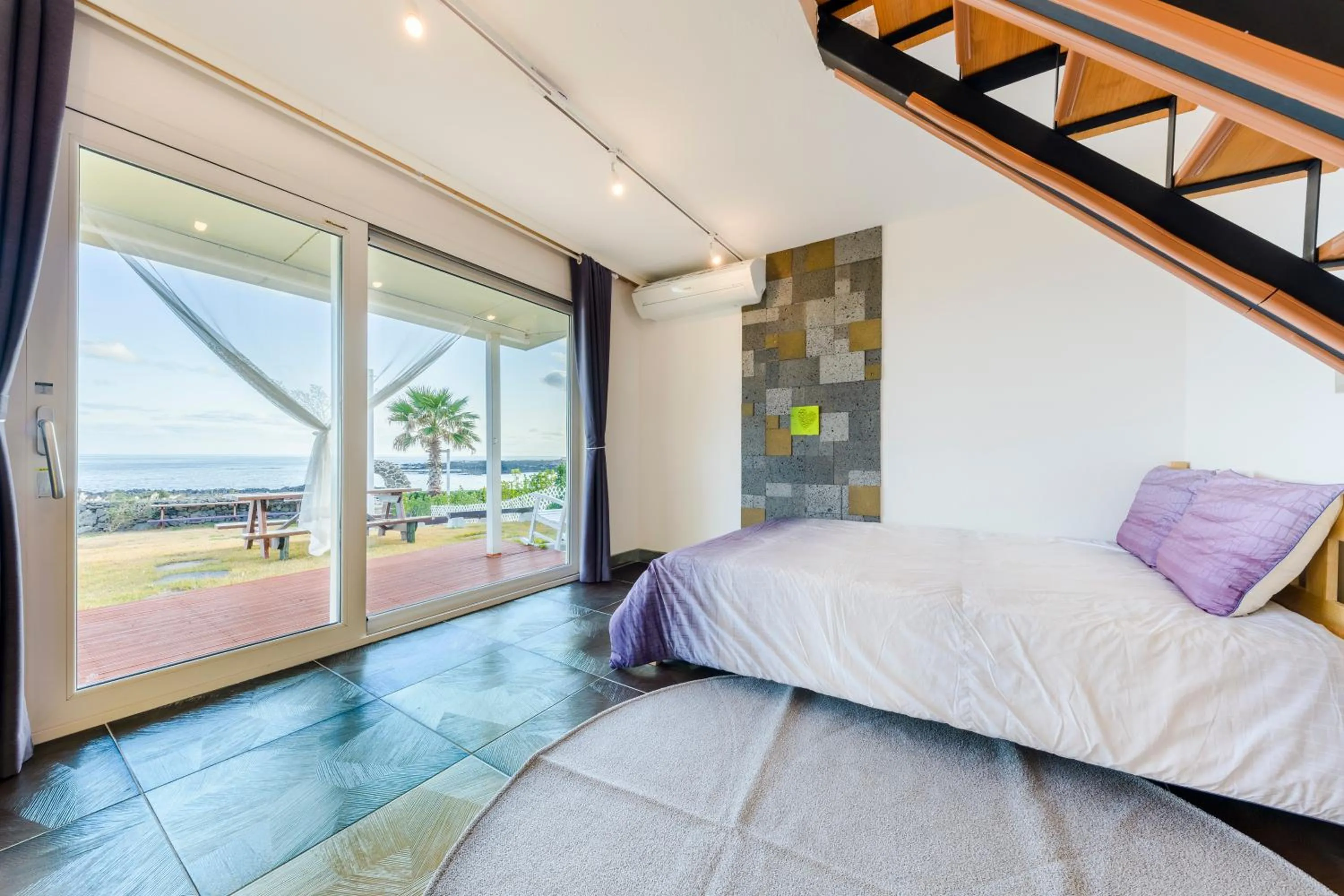 Bed in Jeju Turning point Pension