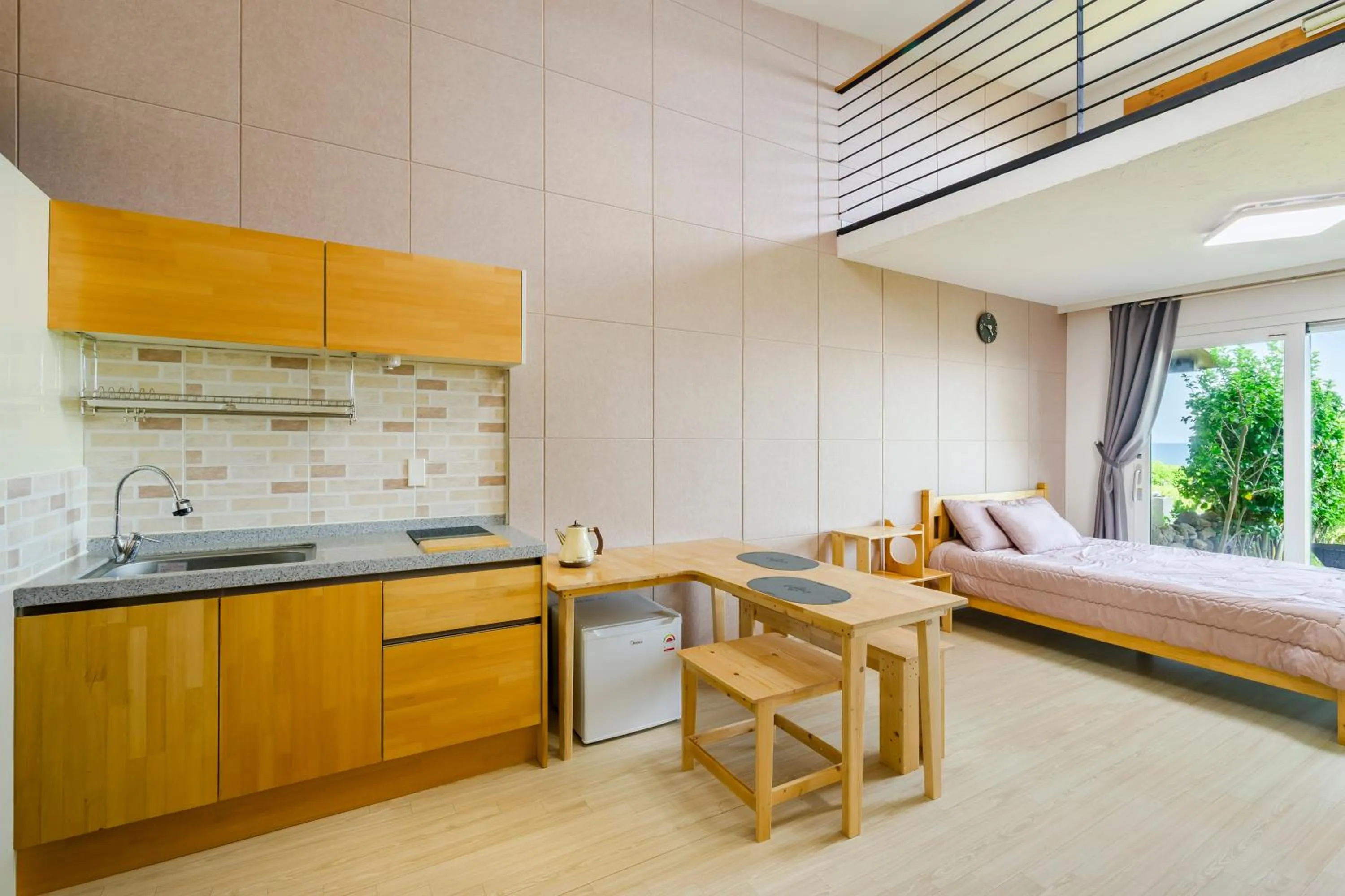 Kitchen or kitchenette in Jeju Turning point Pension