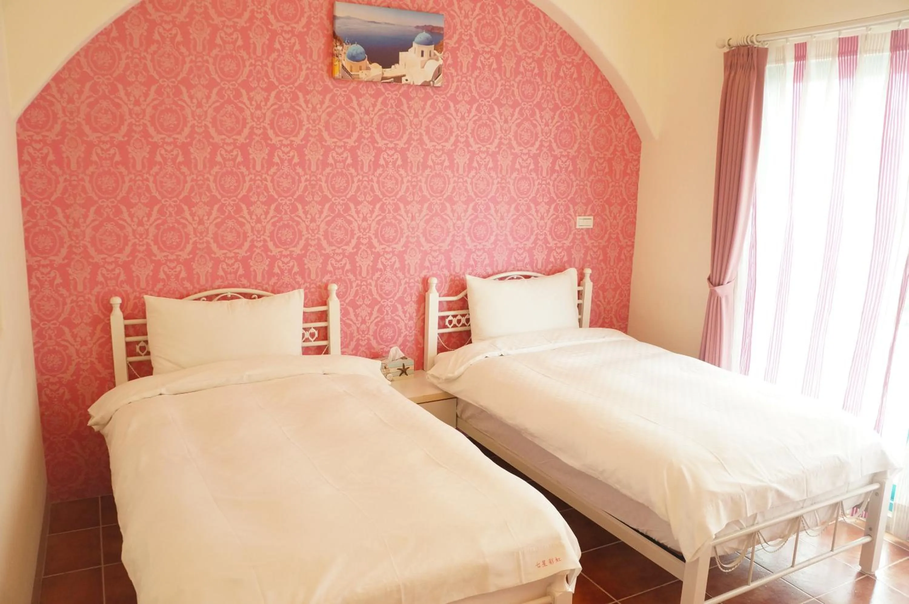 Bed in Rainbow B&B