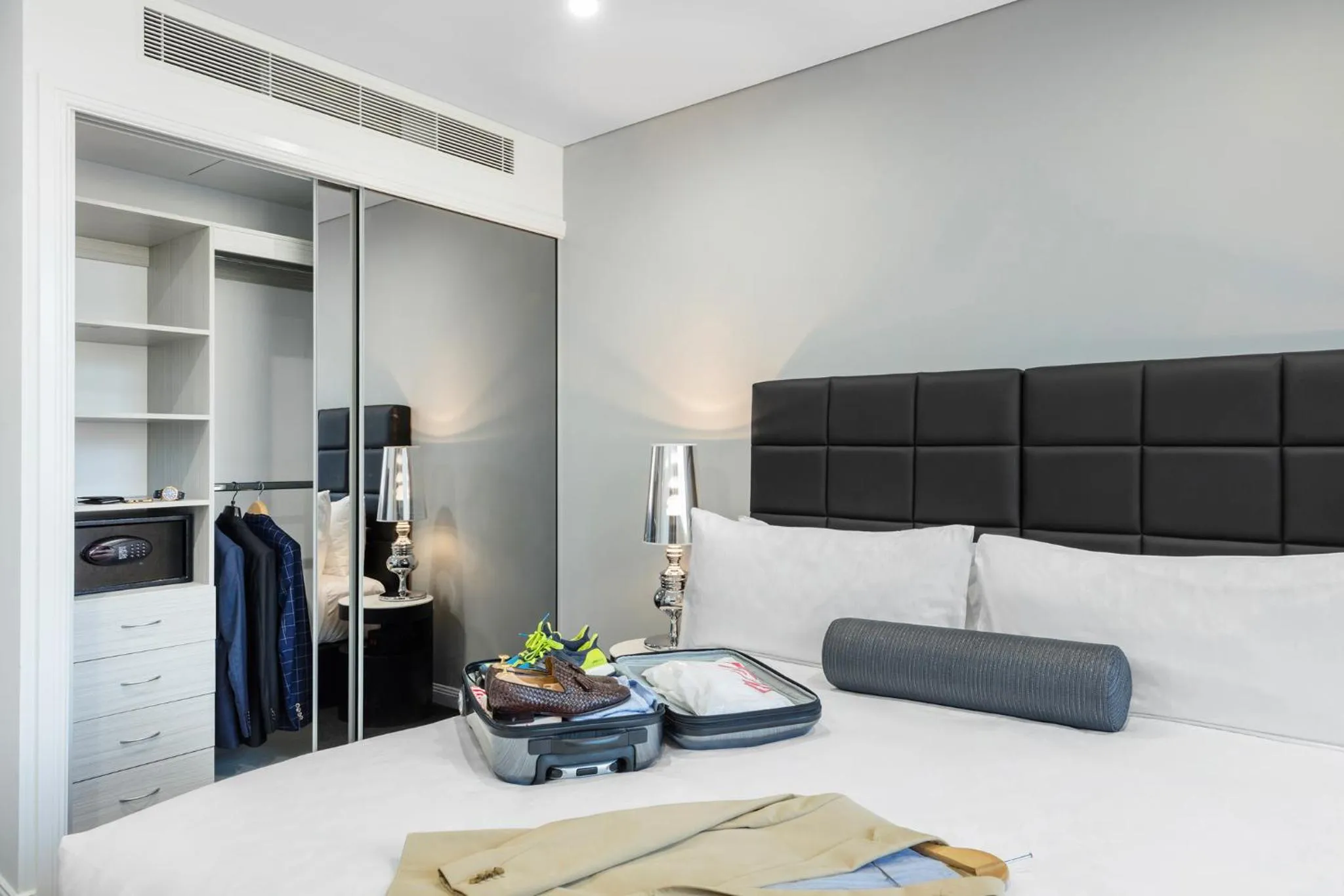 Bed in Meriton Suites North Sydney