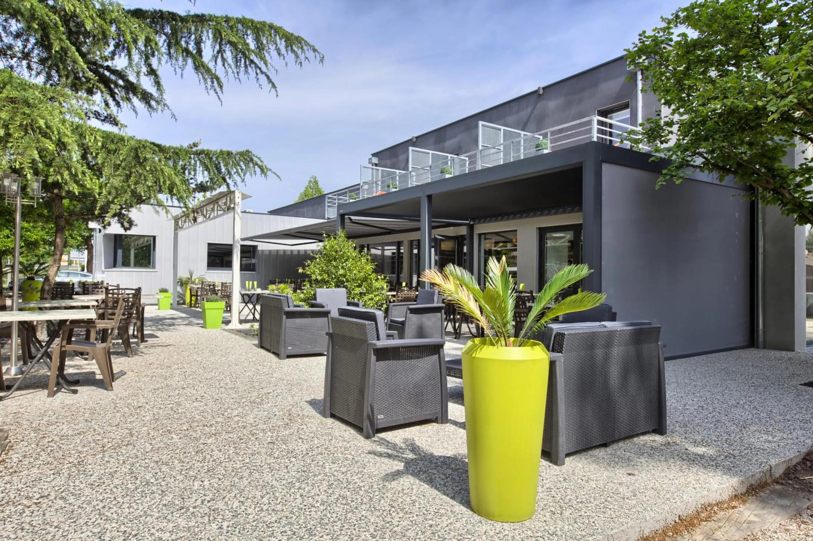 Patio in Logis Hotel Restaurant & SPA Au Comte d'Ornon
