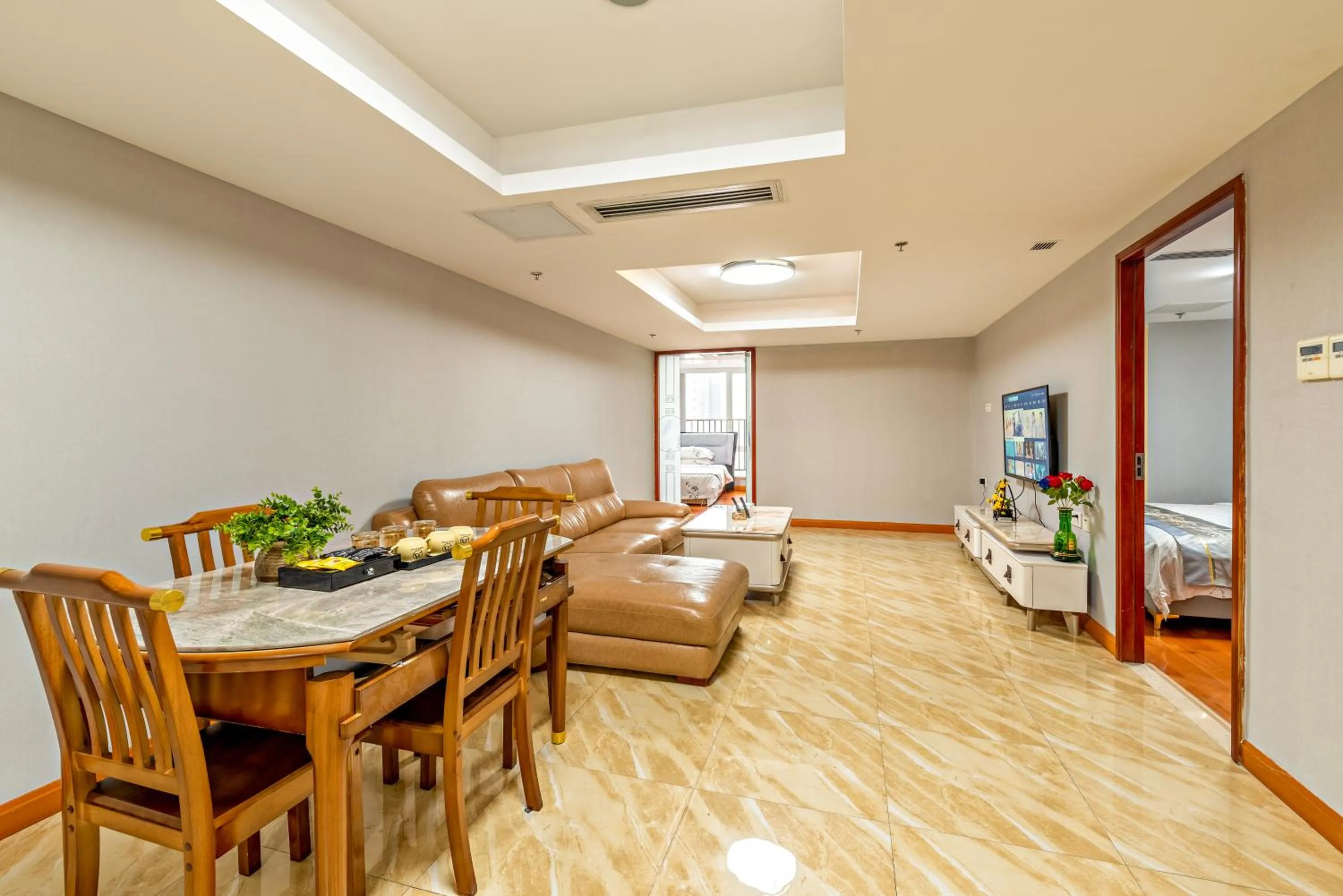 Living room in Guangzhou Manhattan International Apartment Zhengjia Free bus services are provided for the first and second phases