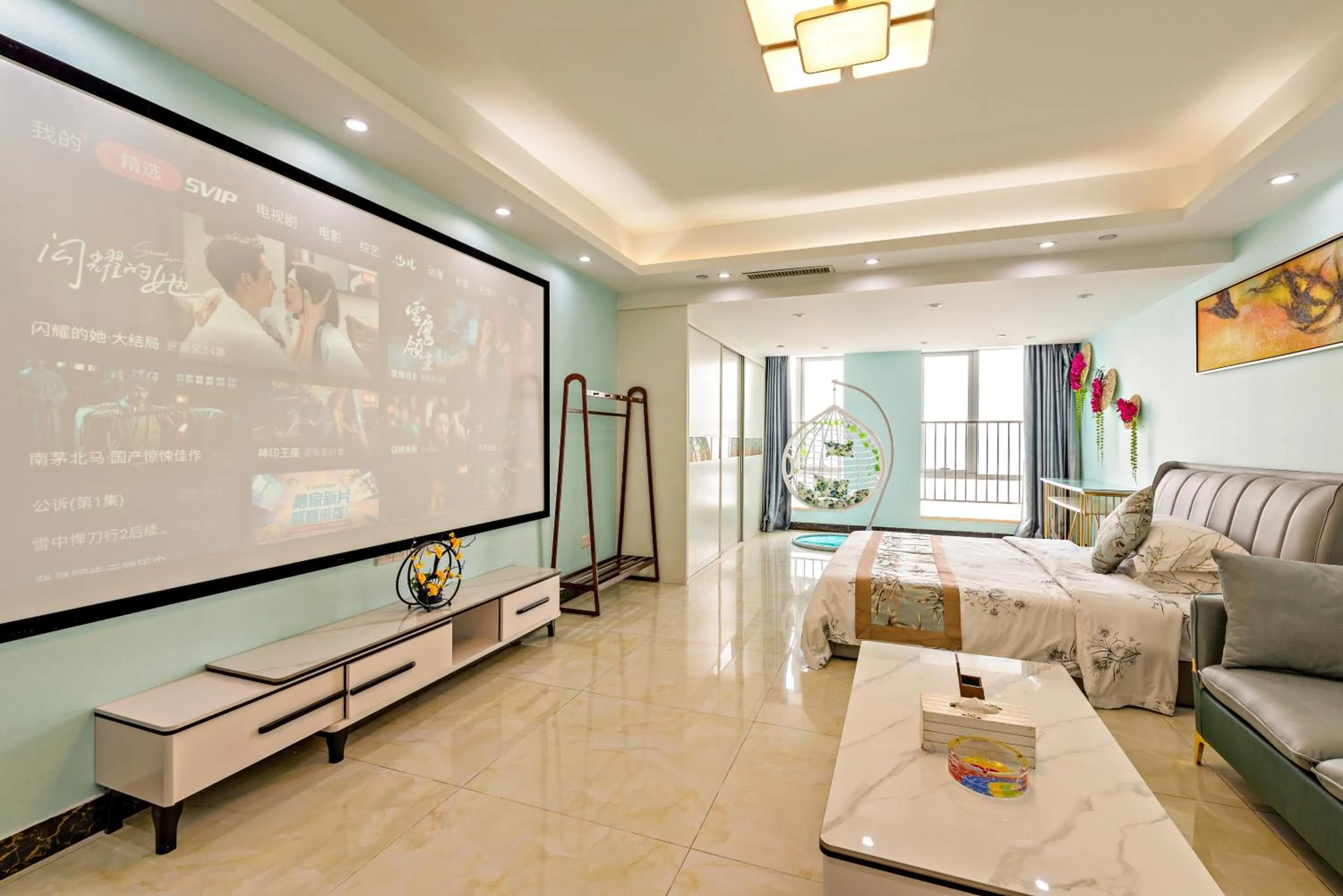 TV and multimedia in Guangzhou Manhattan International Apartment Zhengjia Free bus services are provided for the first and second phases