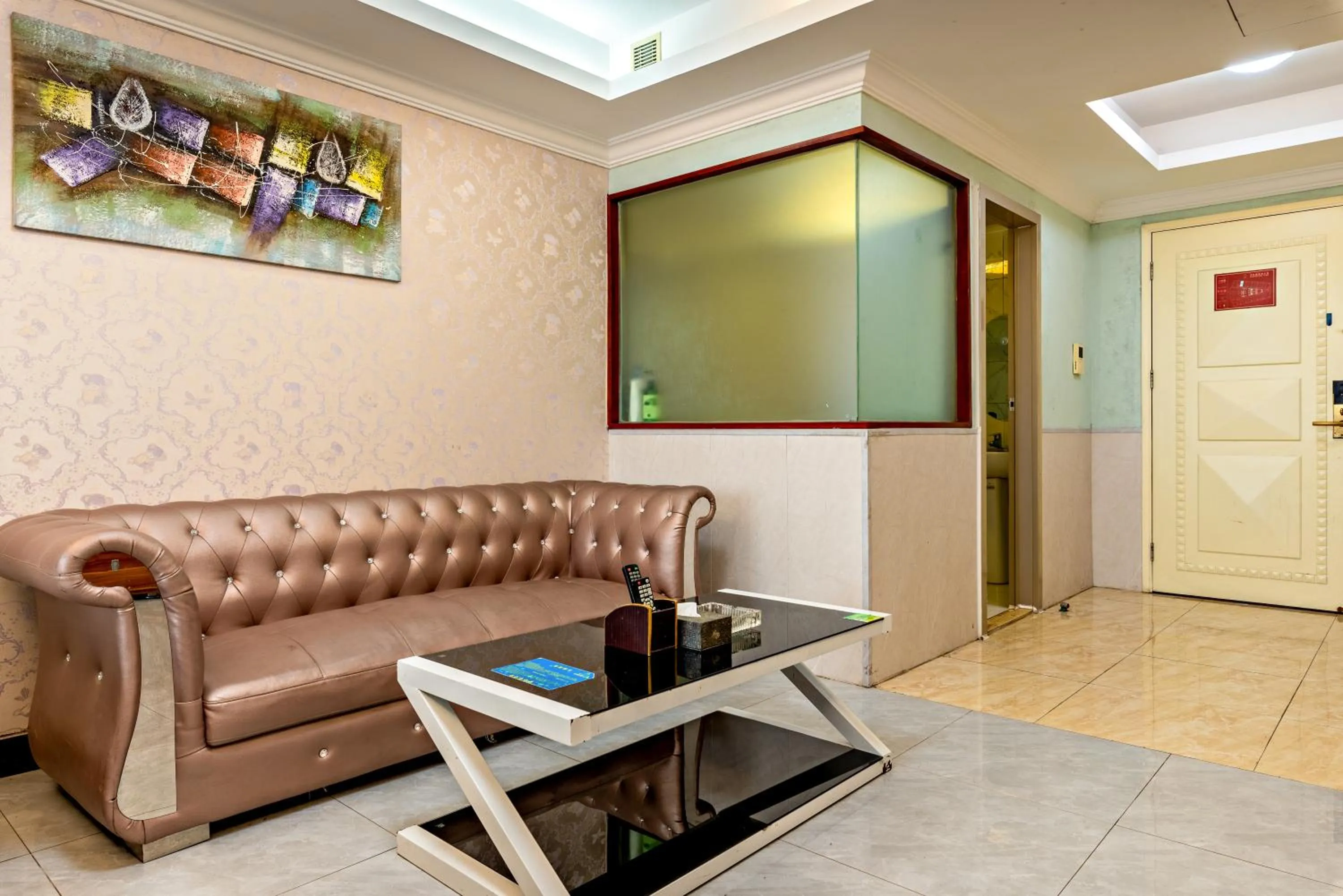 Living room in Guangzhou Manhattan International Apartment Zhengjia Free bus services are provided for the first and second phases