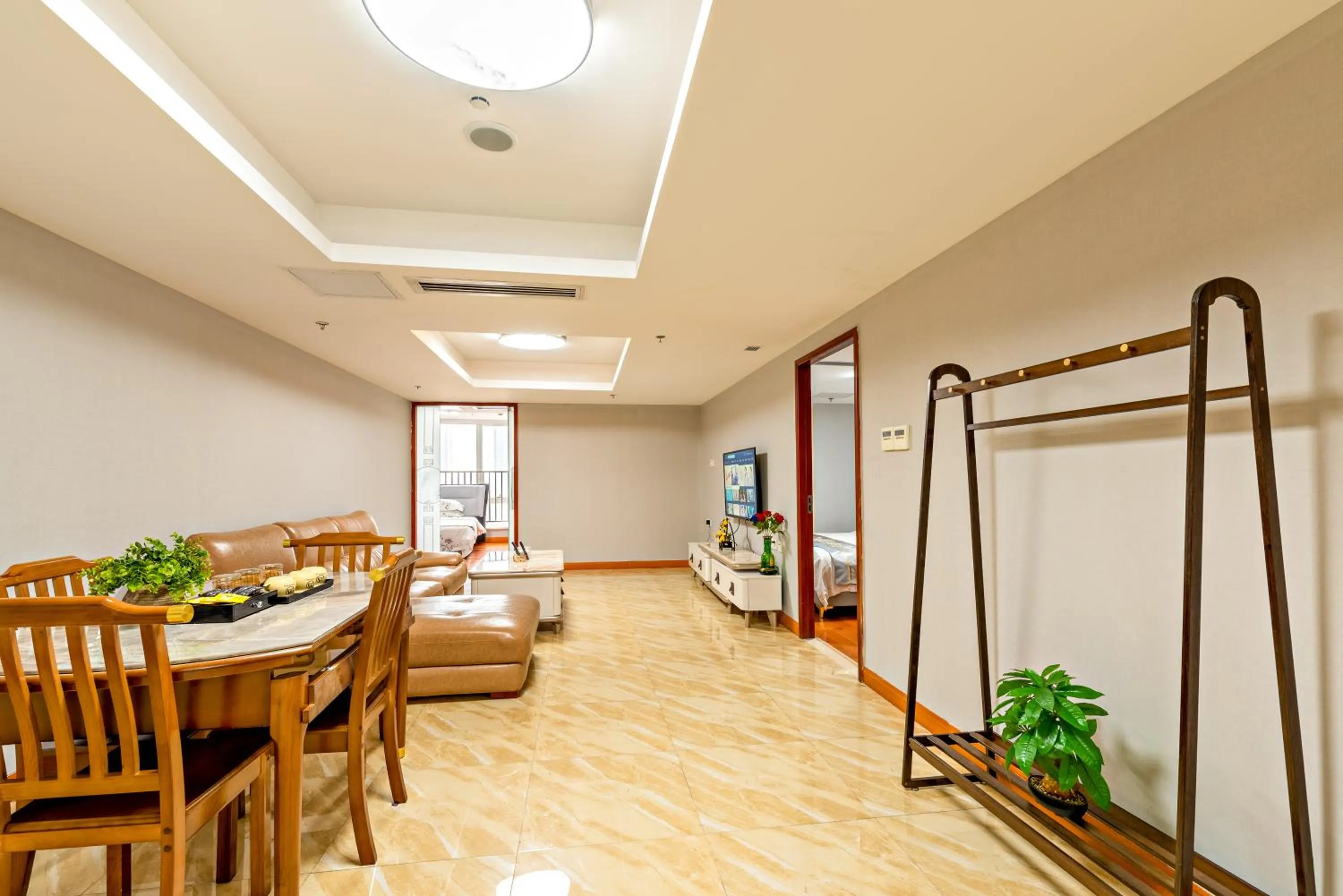 Living room in Guangzhou Manhattan International Apartment Zhengjia Free bus services are provided for the first and second phases