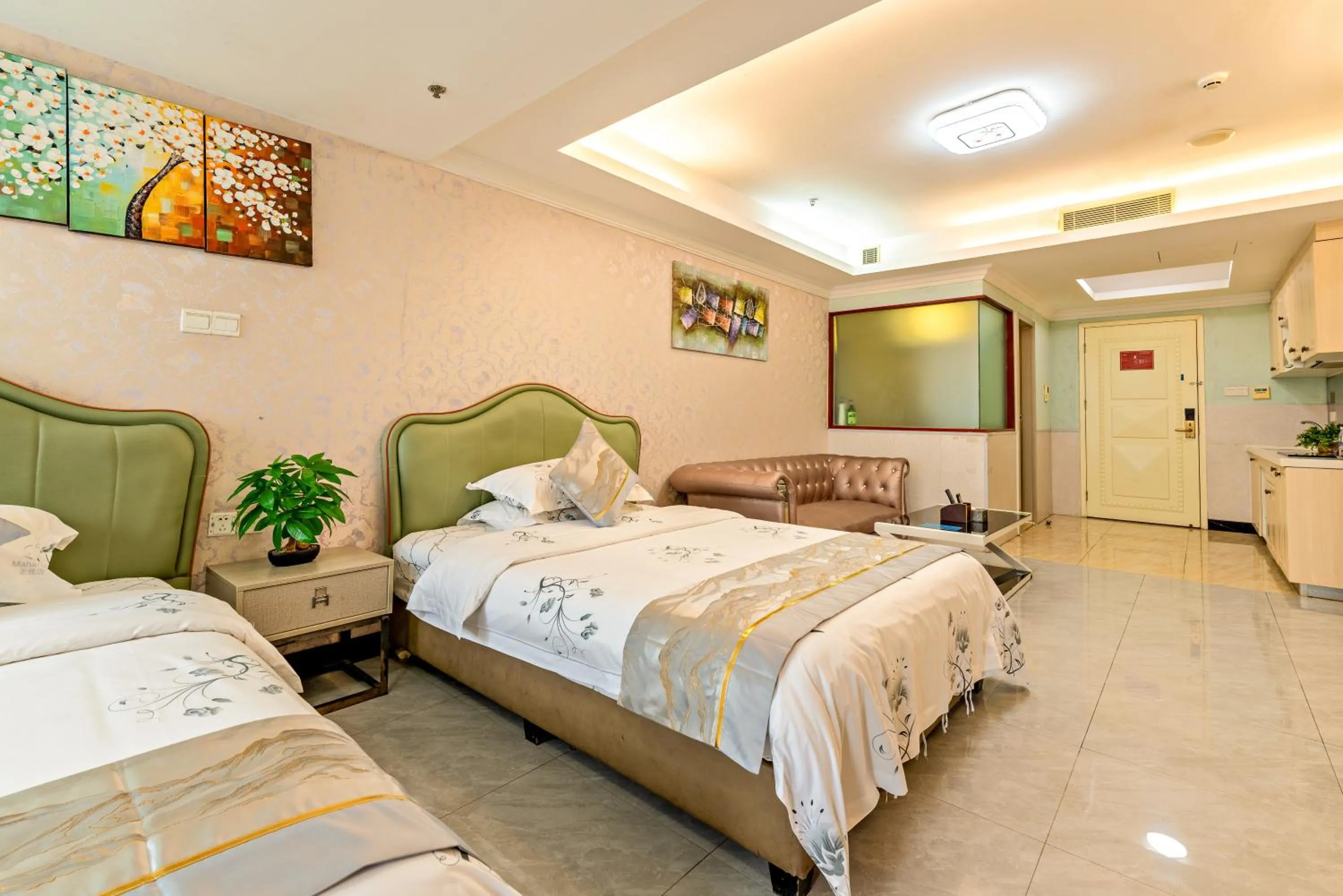 Bed in Guangzhou Manhattan International Apartment Zhengjia Free bus services are provided for the first and second phases