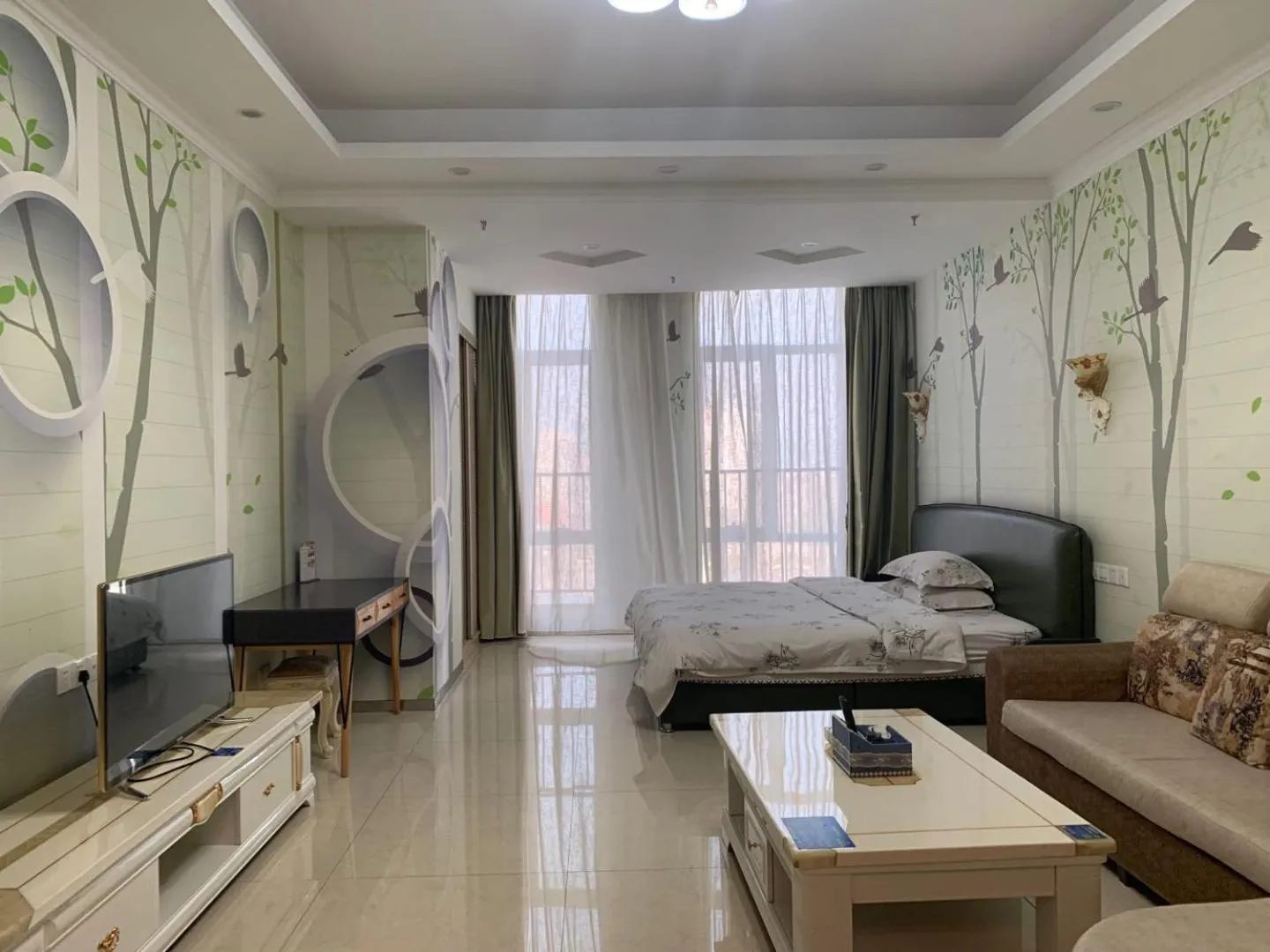 Bedroom in Guangzhou Manhattan International Apartment Zhengjia Free bus services are provided for the first and second phases