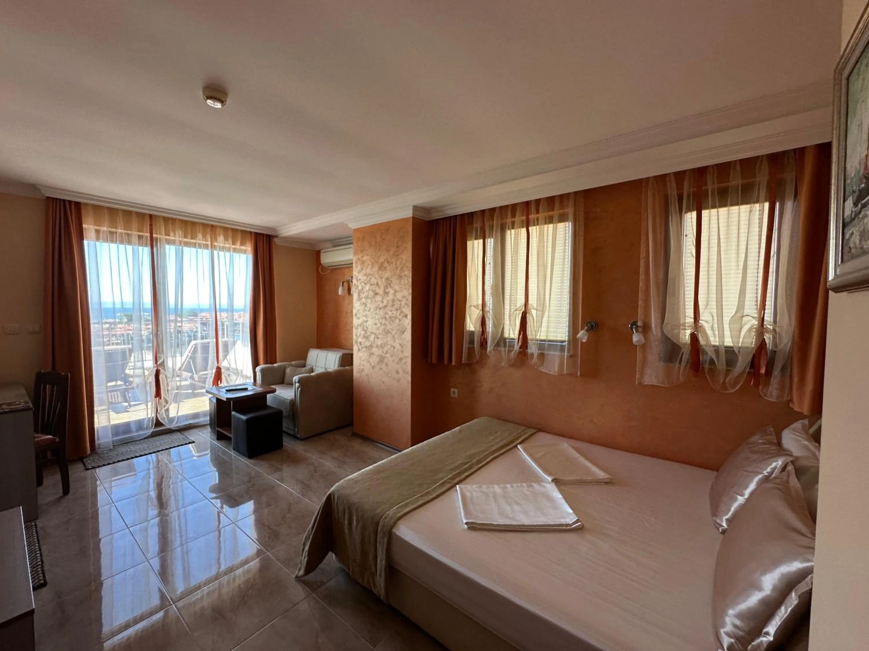 Bed in Family Hotel Radiana