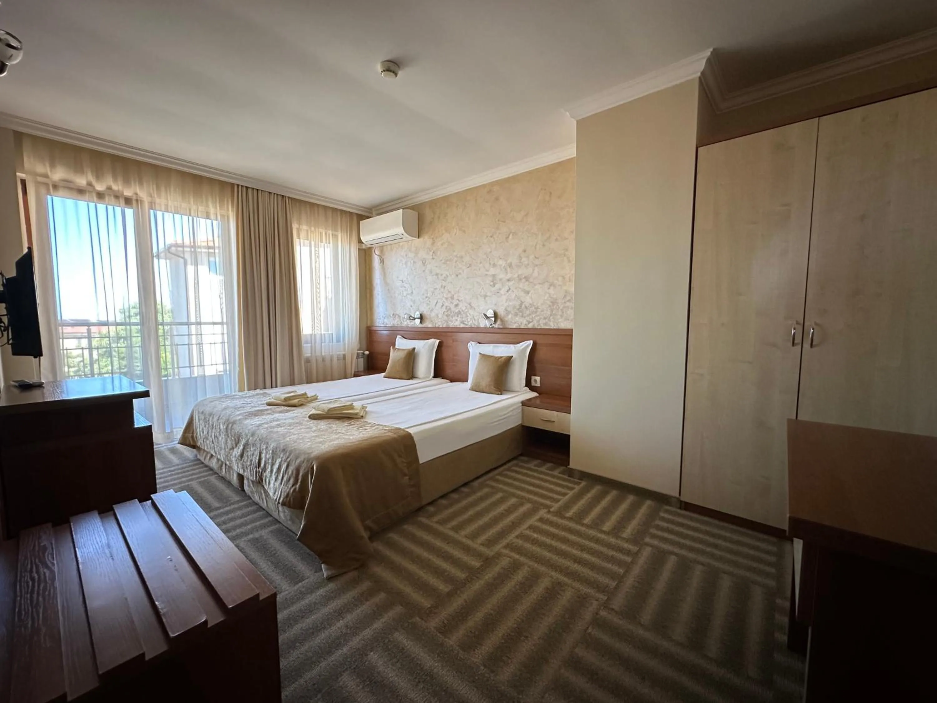 Bed in Family Hotel Radiana