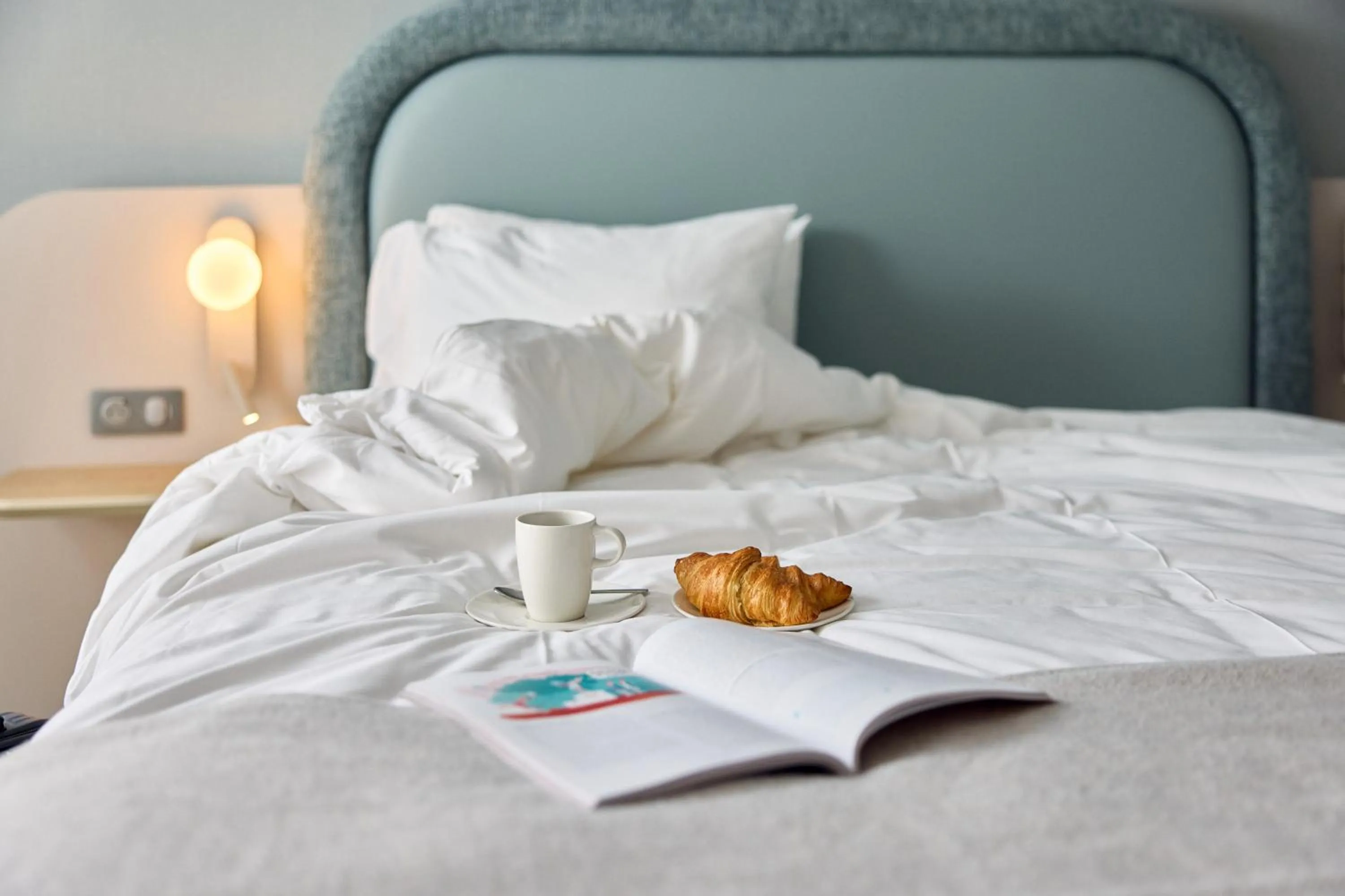 Bed in Van der Valk Hotel Paris CDG Airport