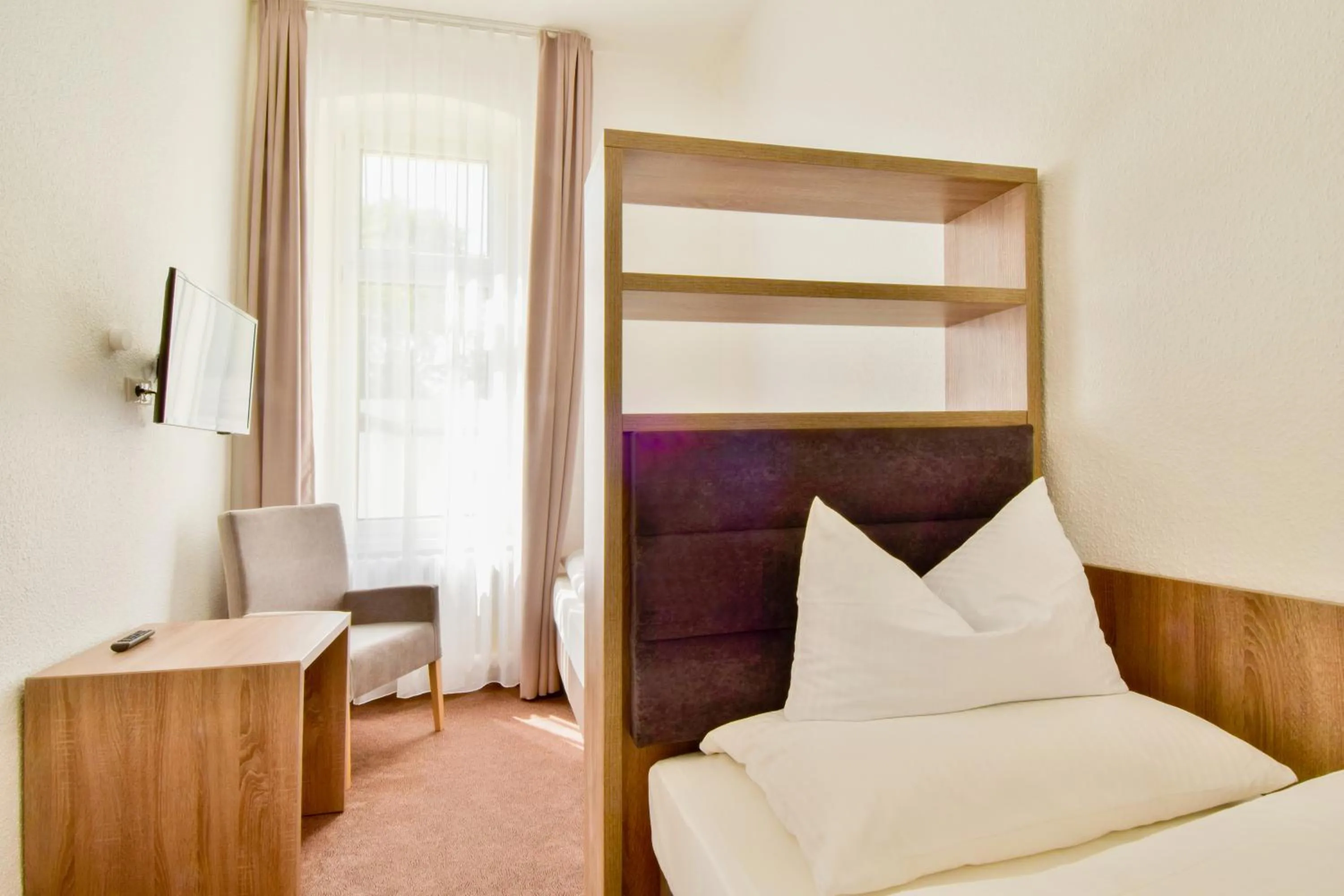 Photo of the whole room, Bed in Villa Auszeit Hotel Garni