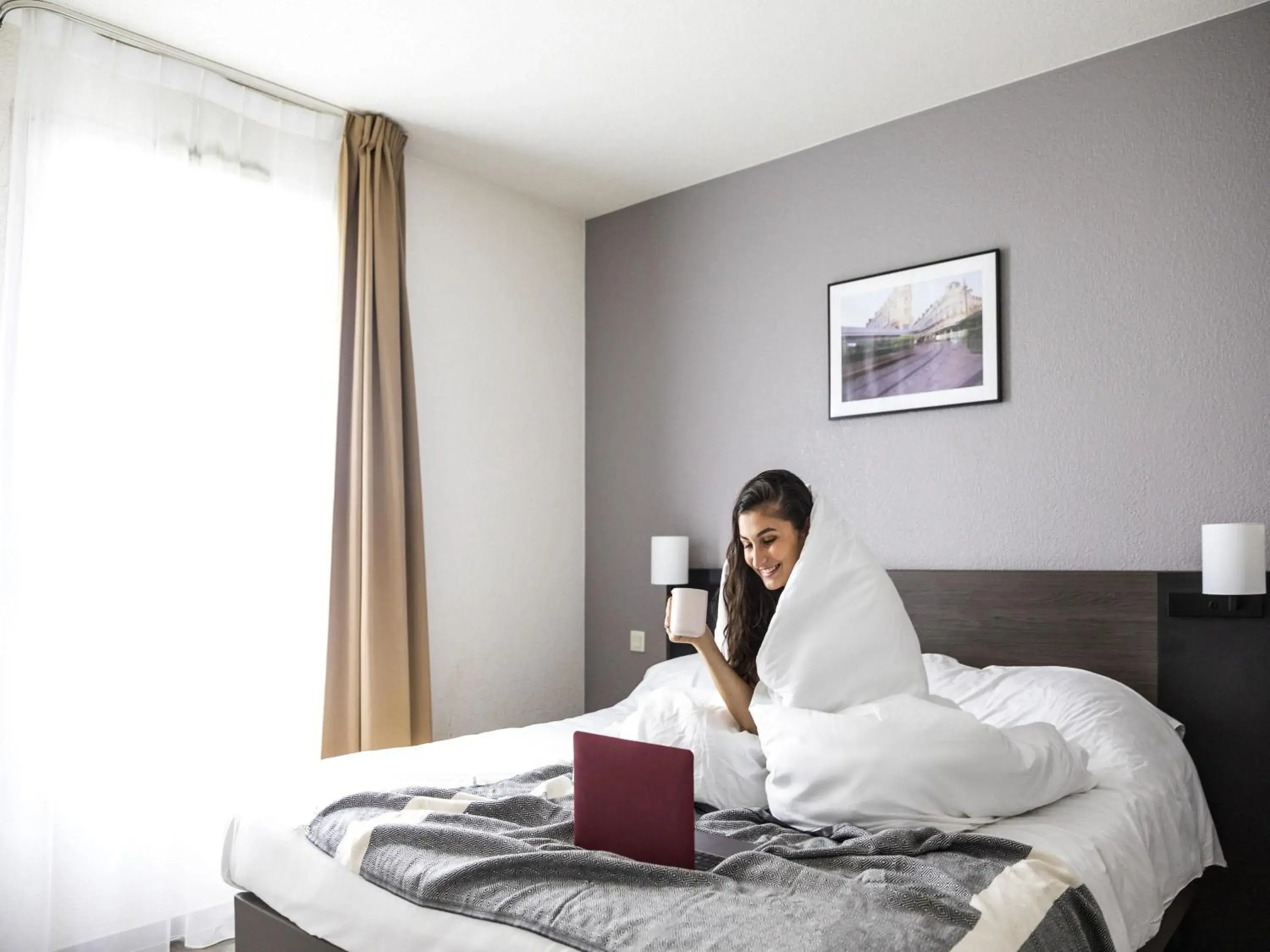 Property building, Bed in Aparthotel Adagio Access Orléans Property building, Bed in Aparthotel Adagio Access Orléans