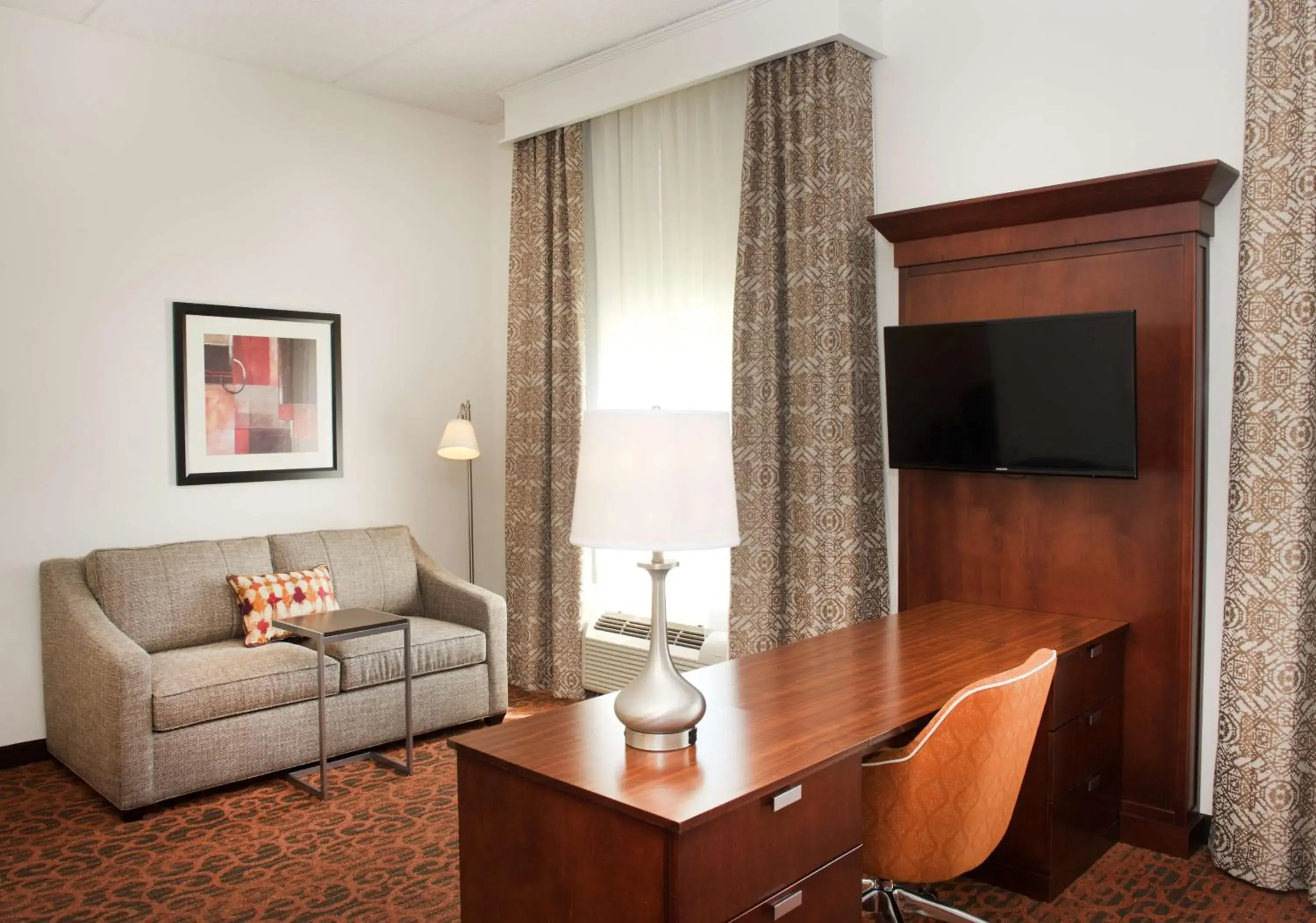 Living room in Hampton Inn & Suites Pittsburgh-Meadow Lands Living room in Hampton Inn & Suites Pittsburgh-Meadow Lands