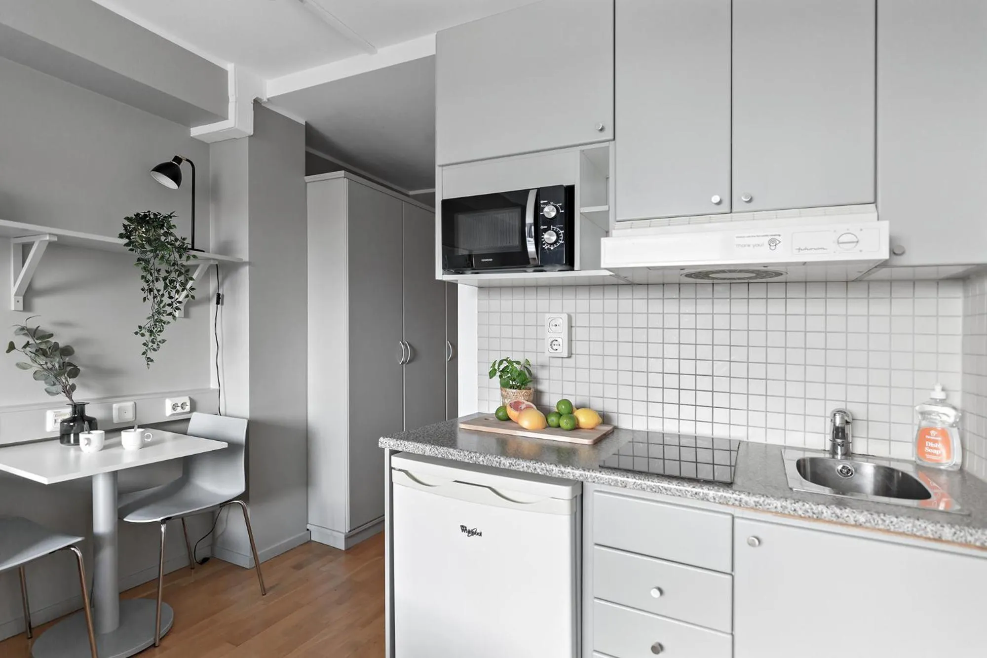 Kitchen or kitchenette in Forenom Hotels & Apartments Stockholm Alvik