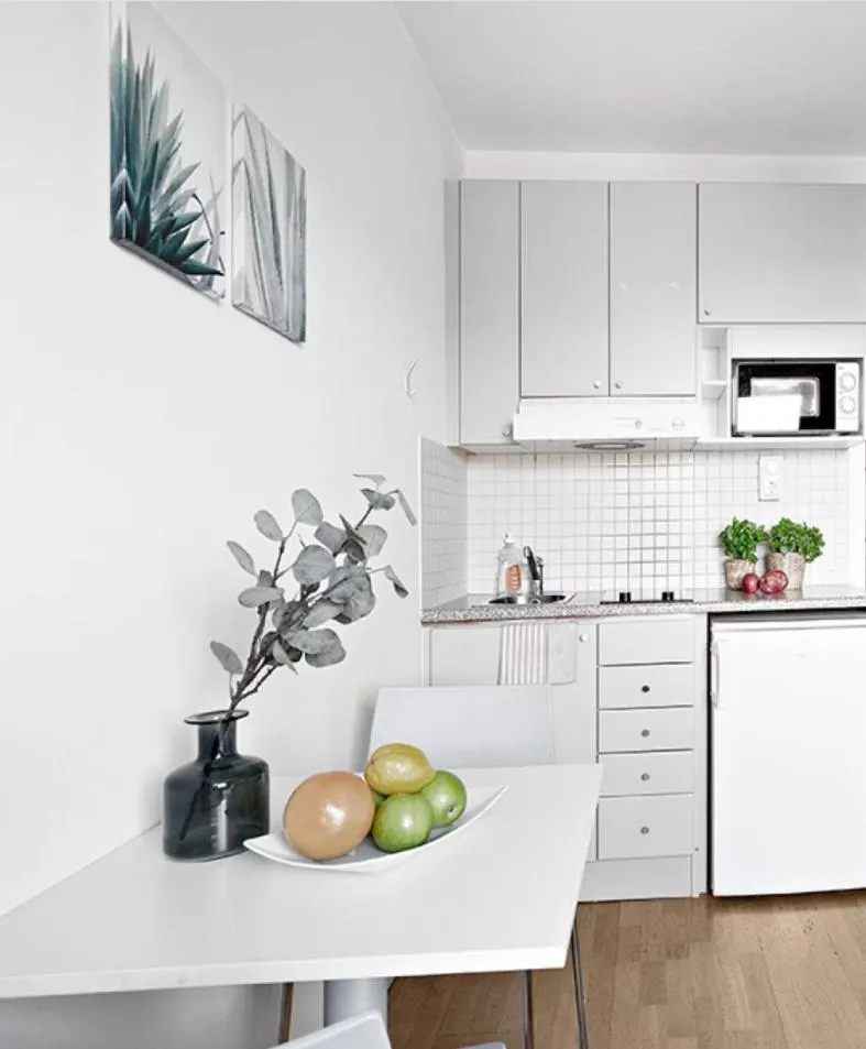 Kitchen or kitchenette in Forenom Hotels & Apartments Stockholm Alvik