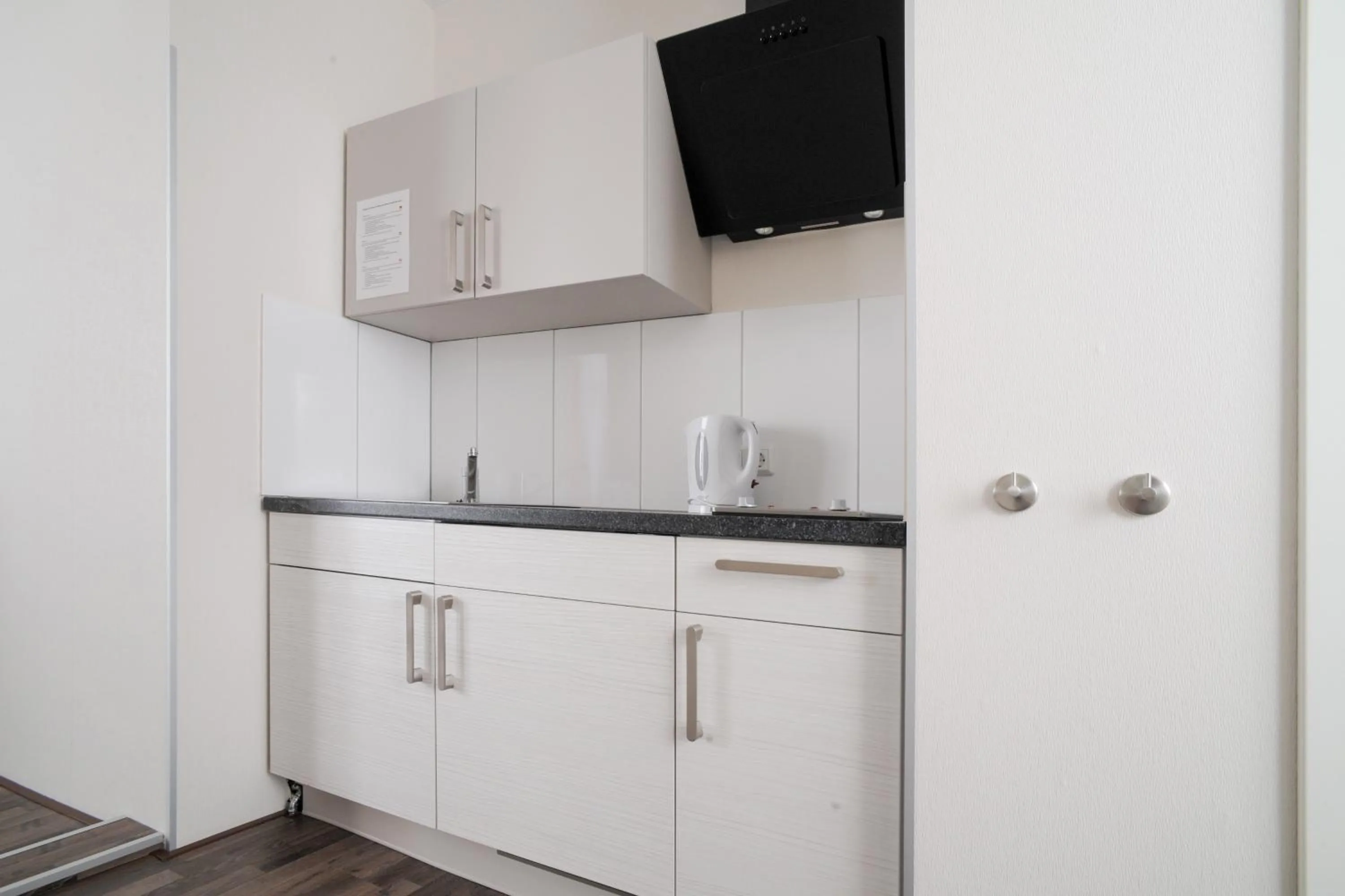 Kitchen or kitchenette in Le petit Palais - Apartments