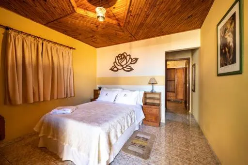 Bed in Pousada Villa Da Montanha