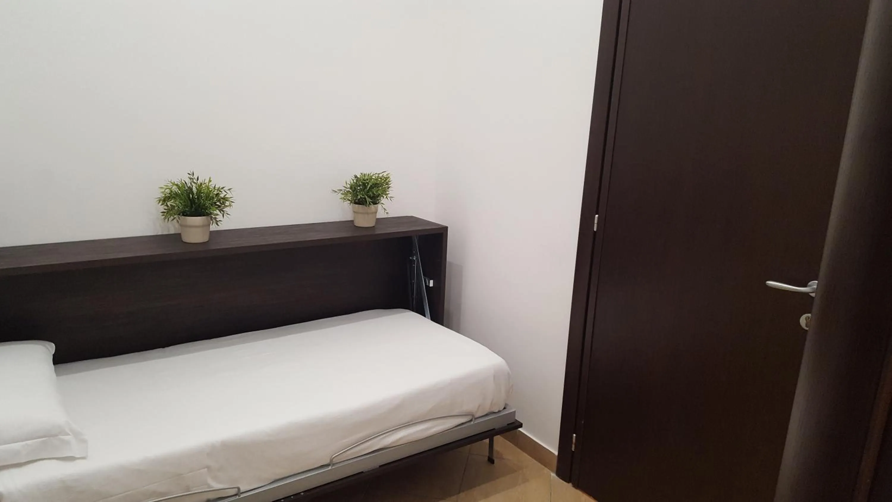 Bed in Una Finestra su Monti