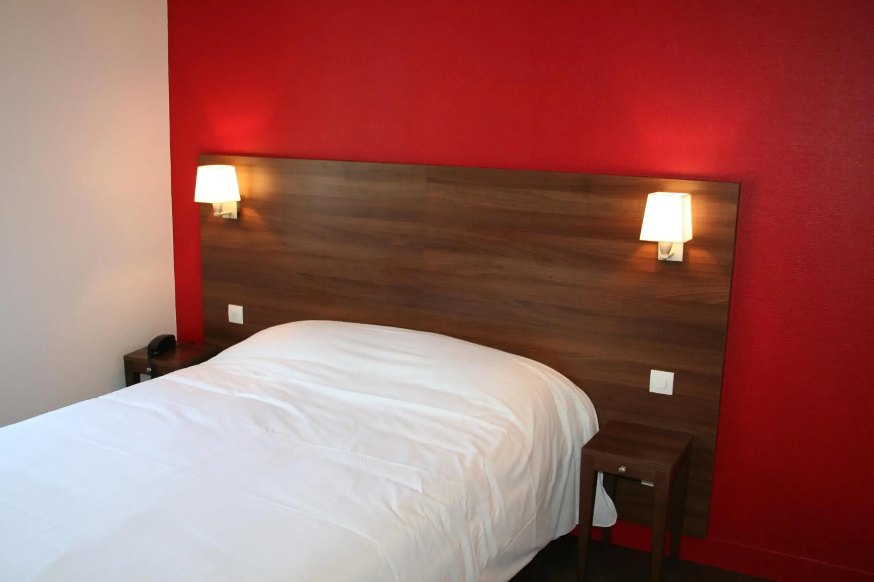 Decorative detail, Bed in Hôtel Montchapet Dijon Centre Decorative detail, Bed in Hôtel Montchapet Dijon Centre